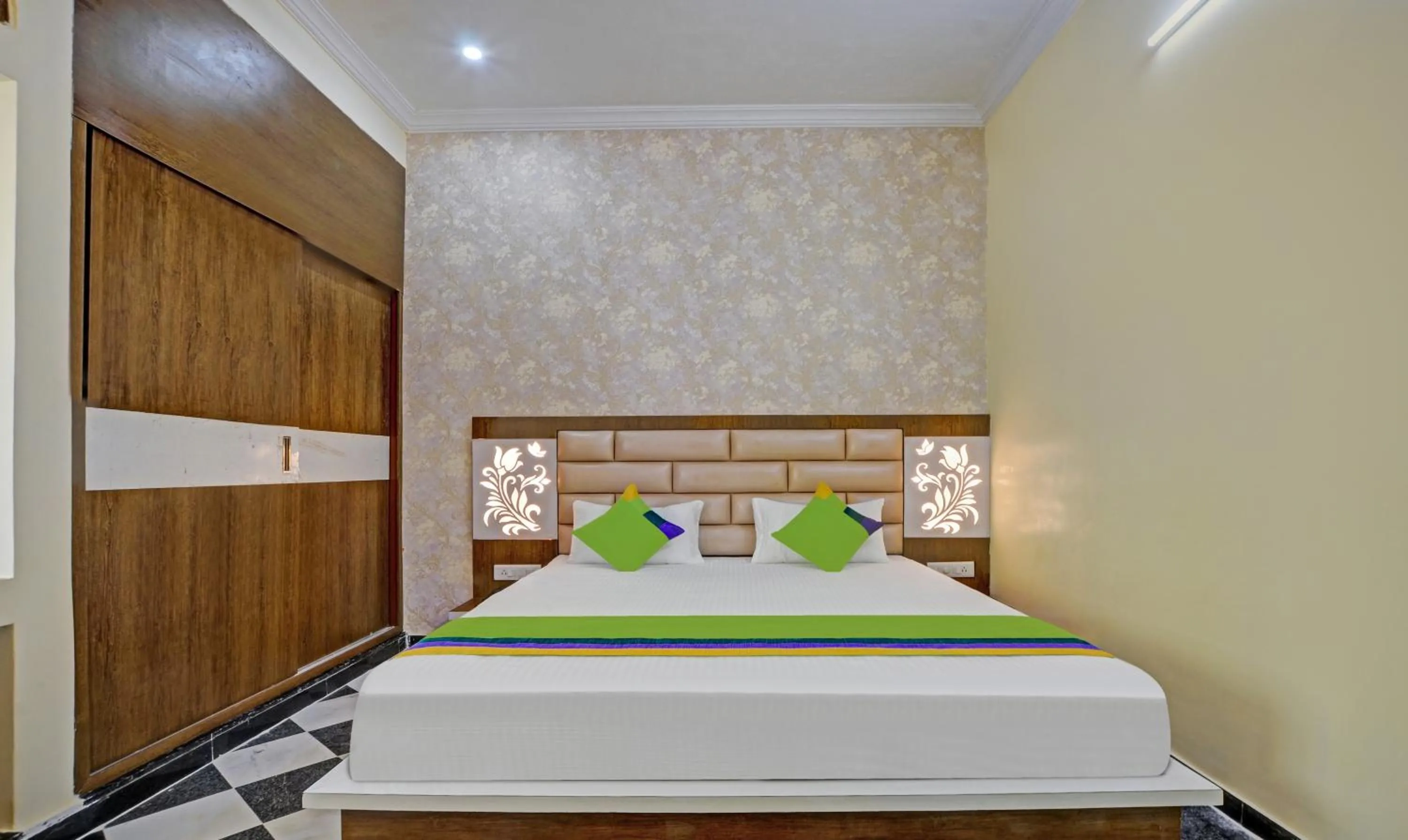 Bed in Hotel Vishvam Residency Udaipur