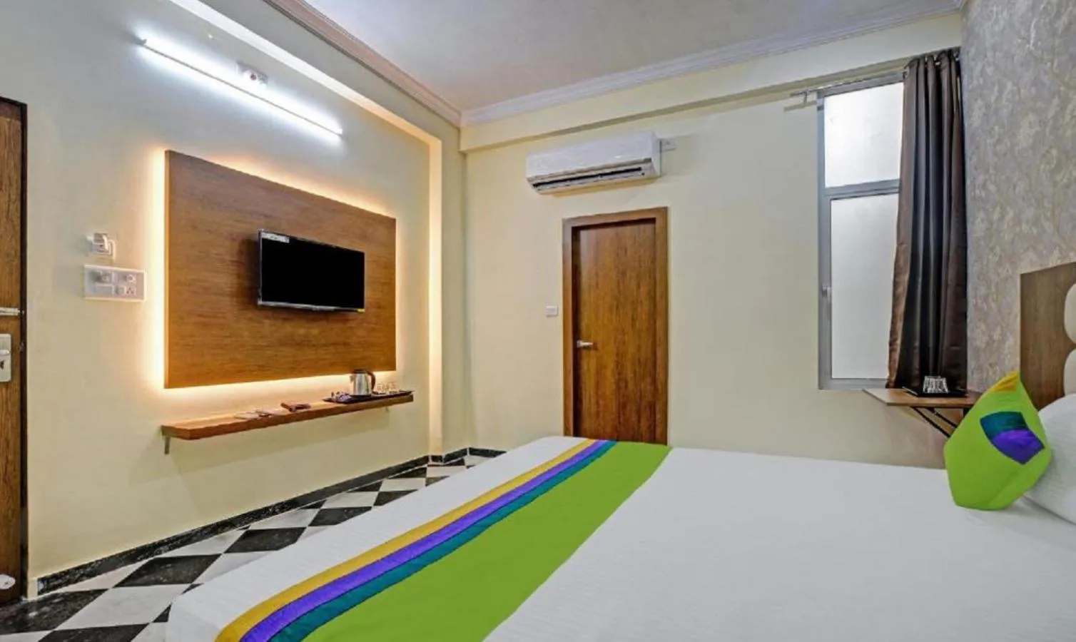 Bed in Hotel Vishvam Residency Udaipur