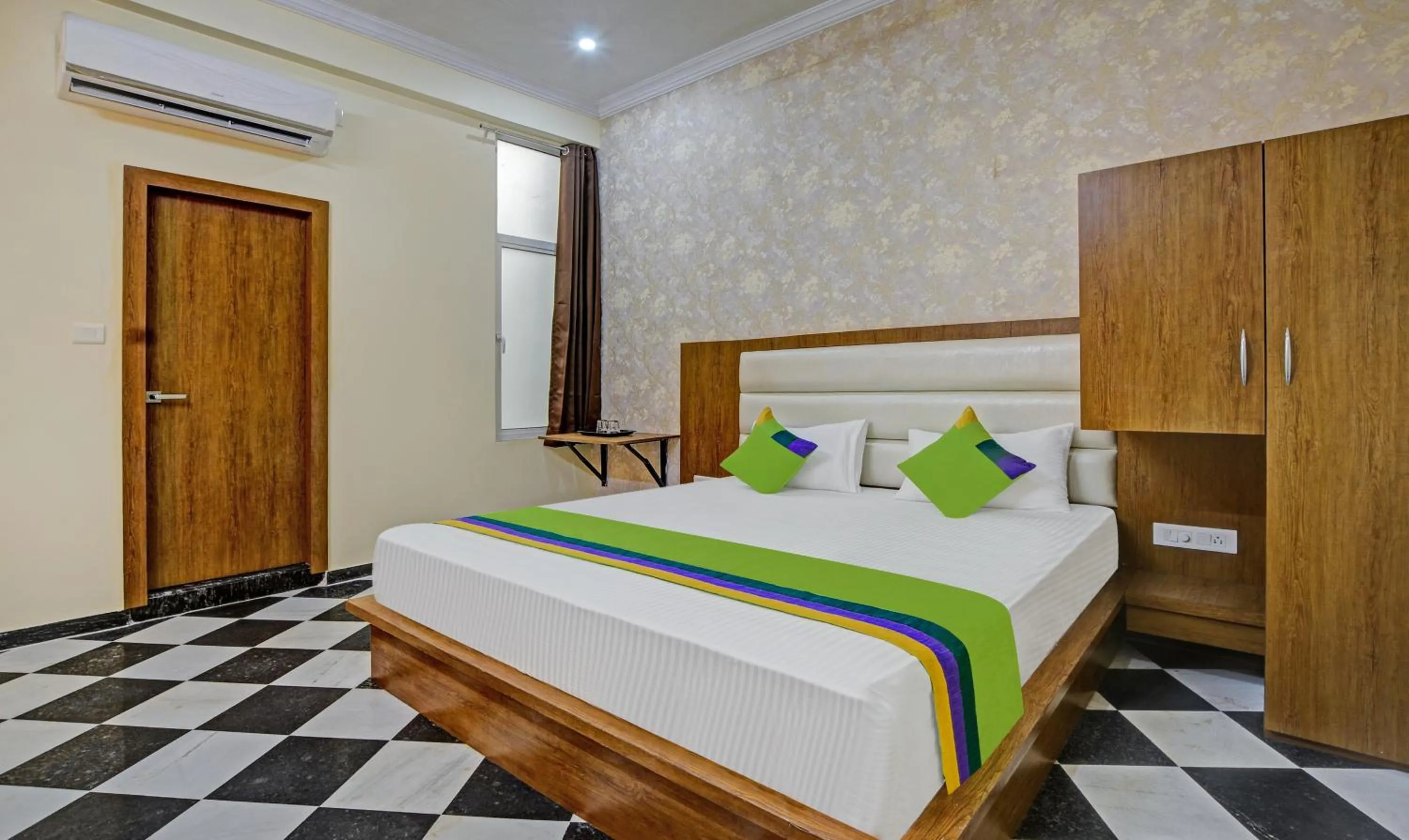 Bed in Hotel Vishvam Residency Udaipur