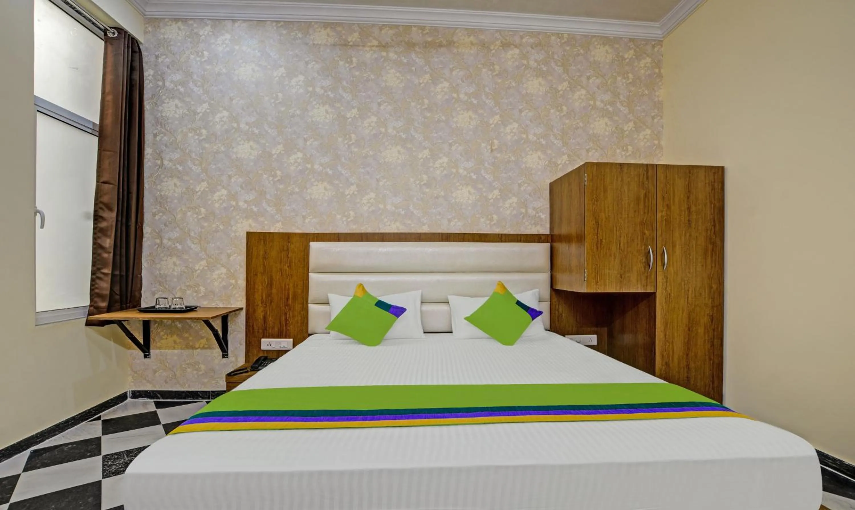Bed in Hotel Vishvam Residency Udaipur