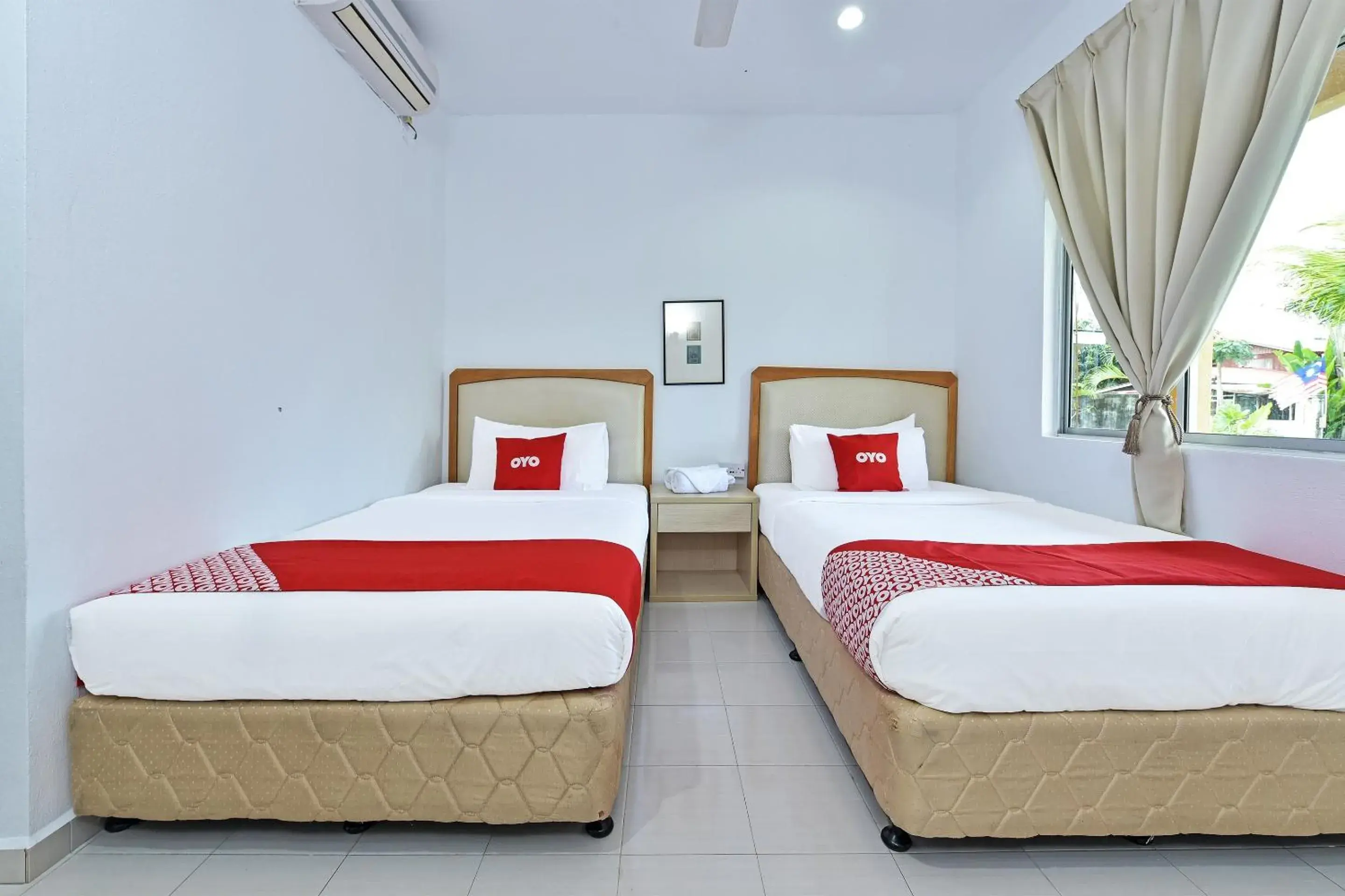 Deluxe Twin Room in Collection O 90622 Sehijau Cenang Deluxe Twin Room in Collection O 90622 Sehijau Cenang