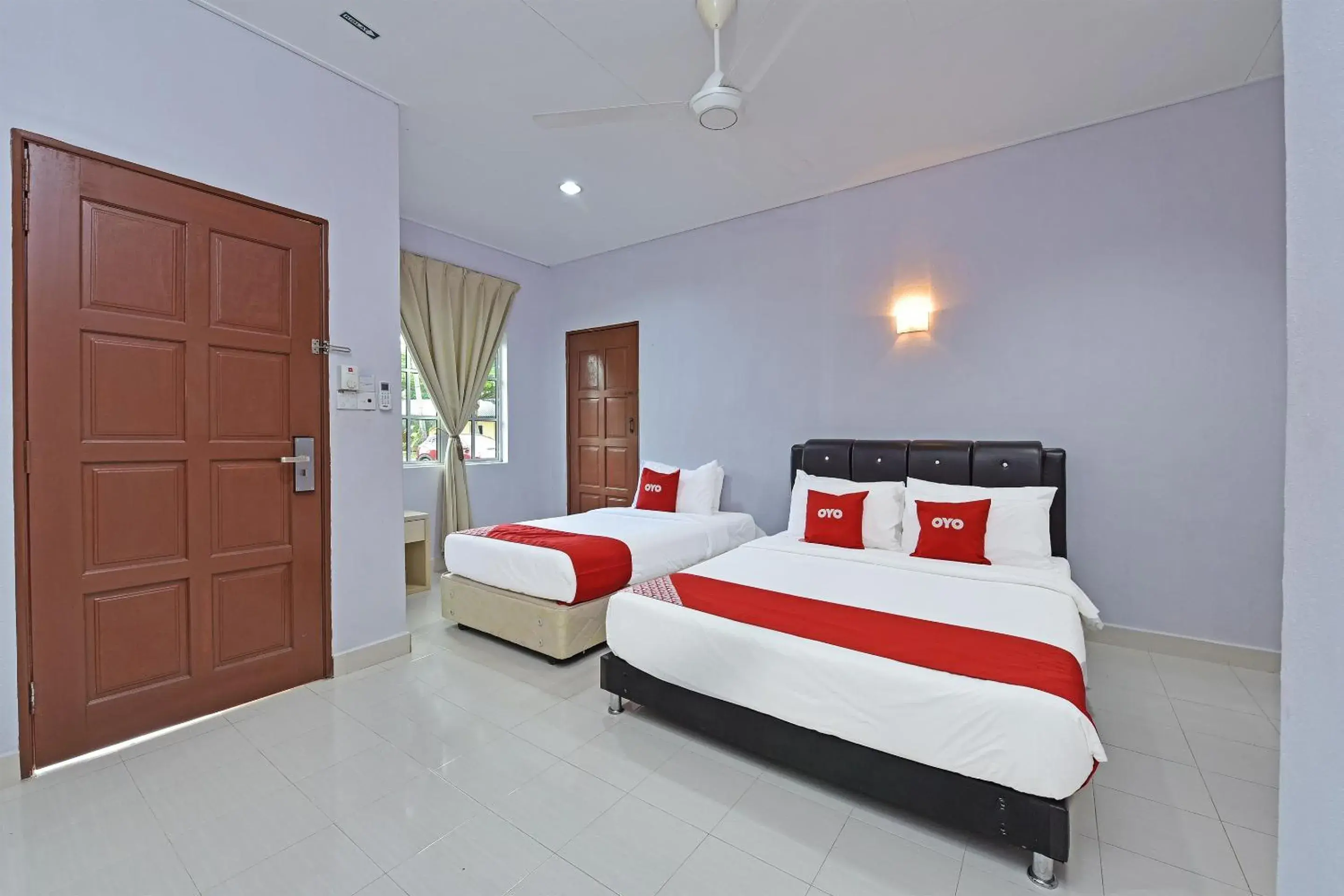 Deluxe Triple Room in Collection O 90622 Sehijau Cenang Deluxe Triple Room in Collection O 90622 Sehijau Cenang