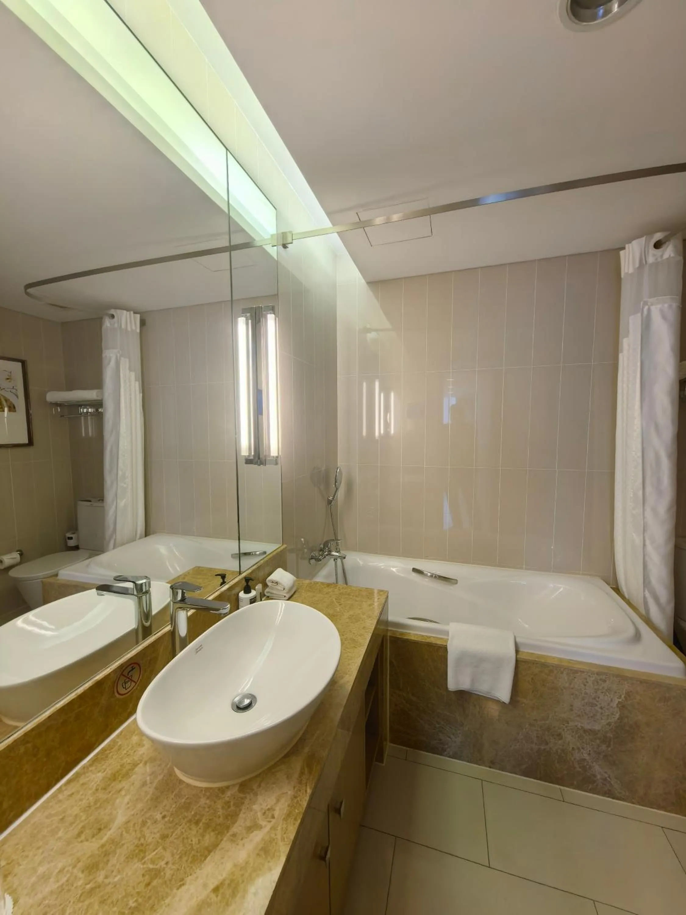 Toilet in Holiday Inn Express Beijing Yizhuang by IHG