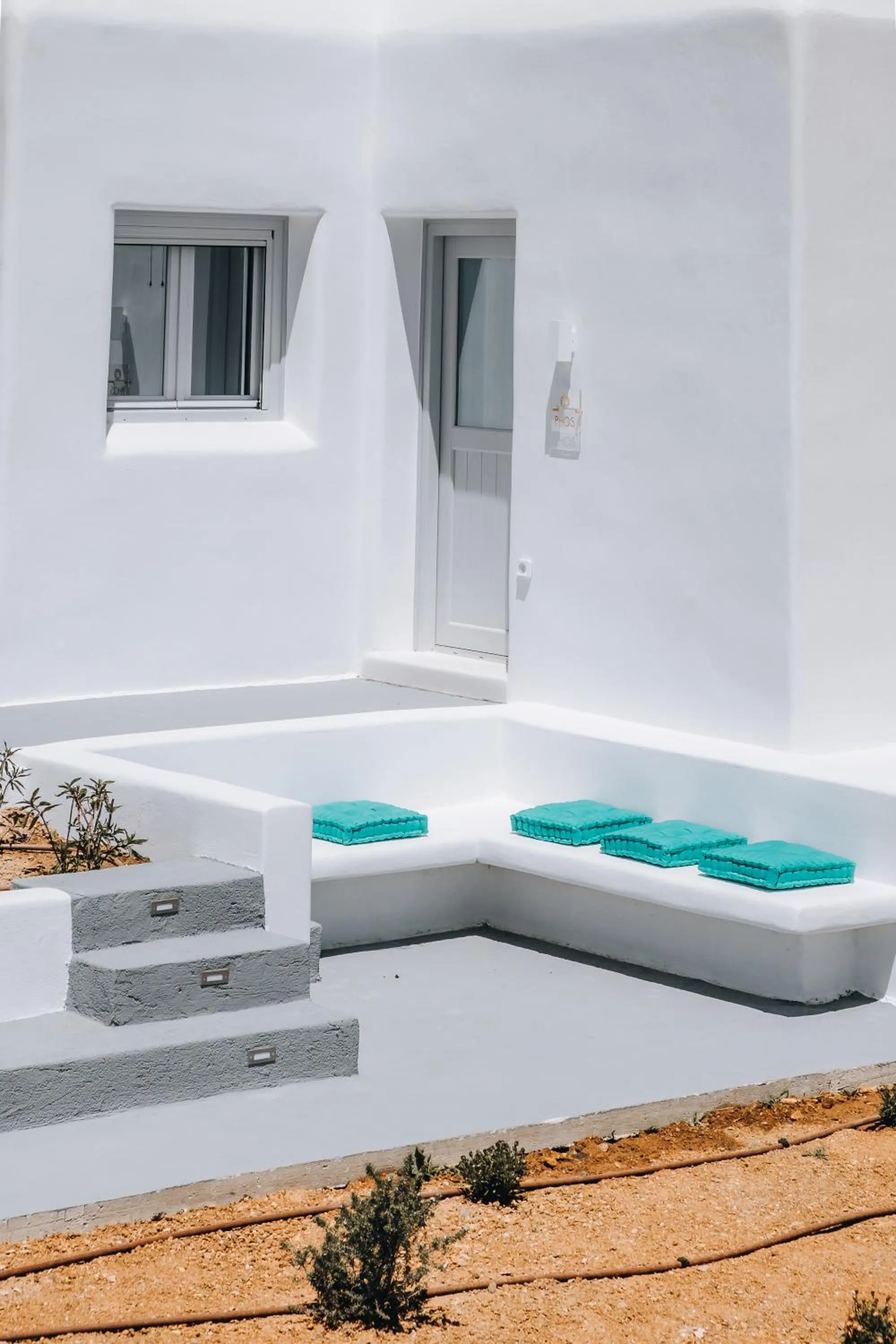 Facade/entrance in Xerolithos Natural Living