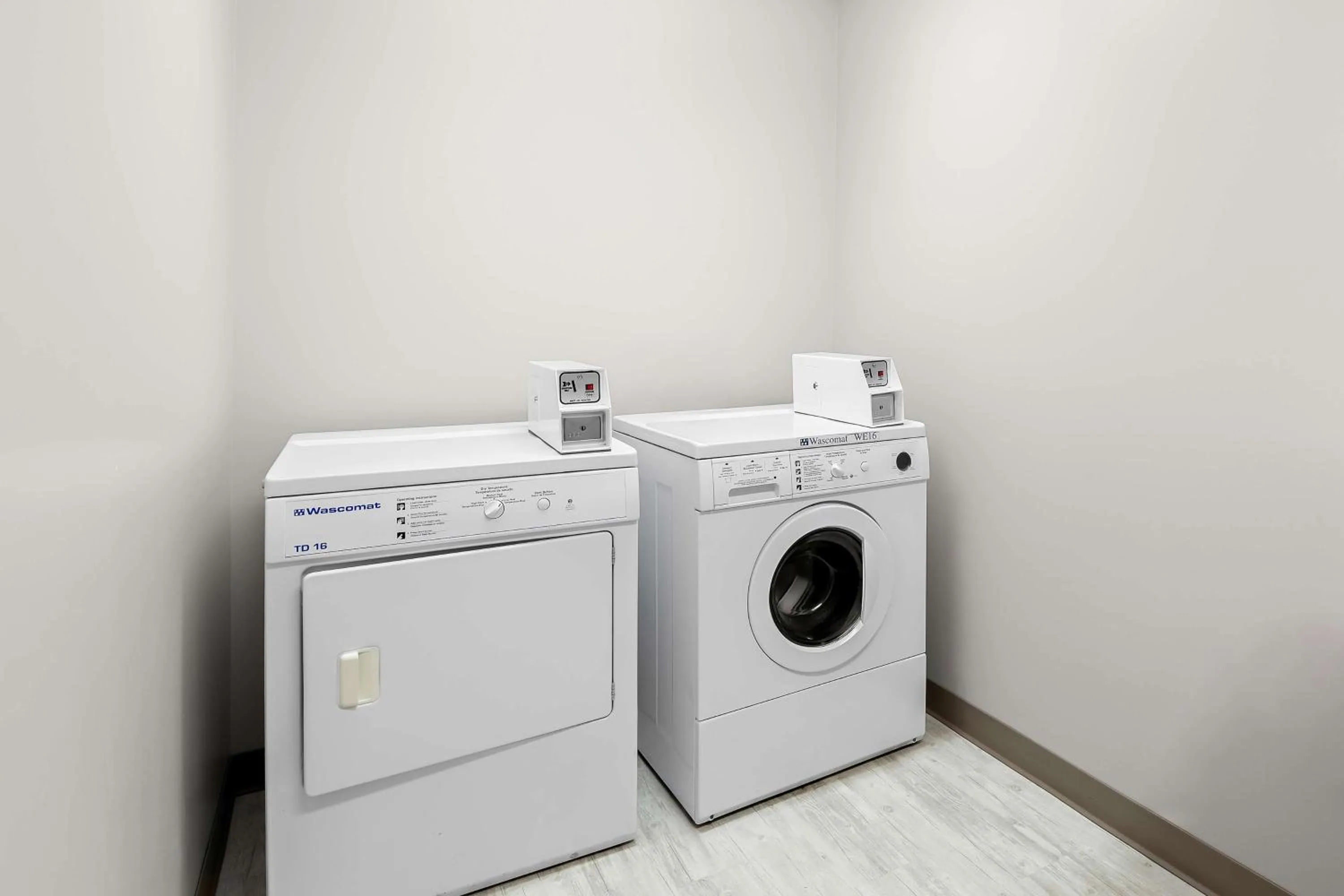 laundry in SureStay Plus Hotel by Best Western Hardisty