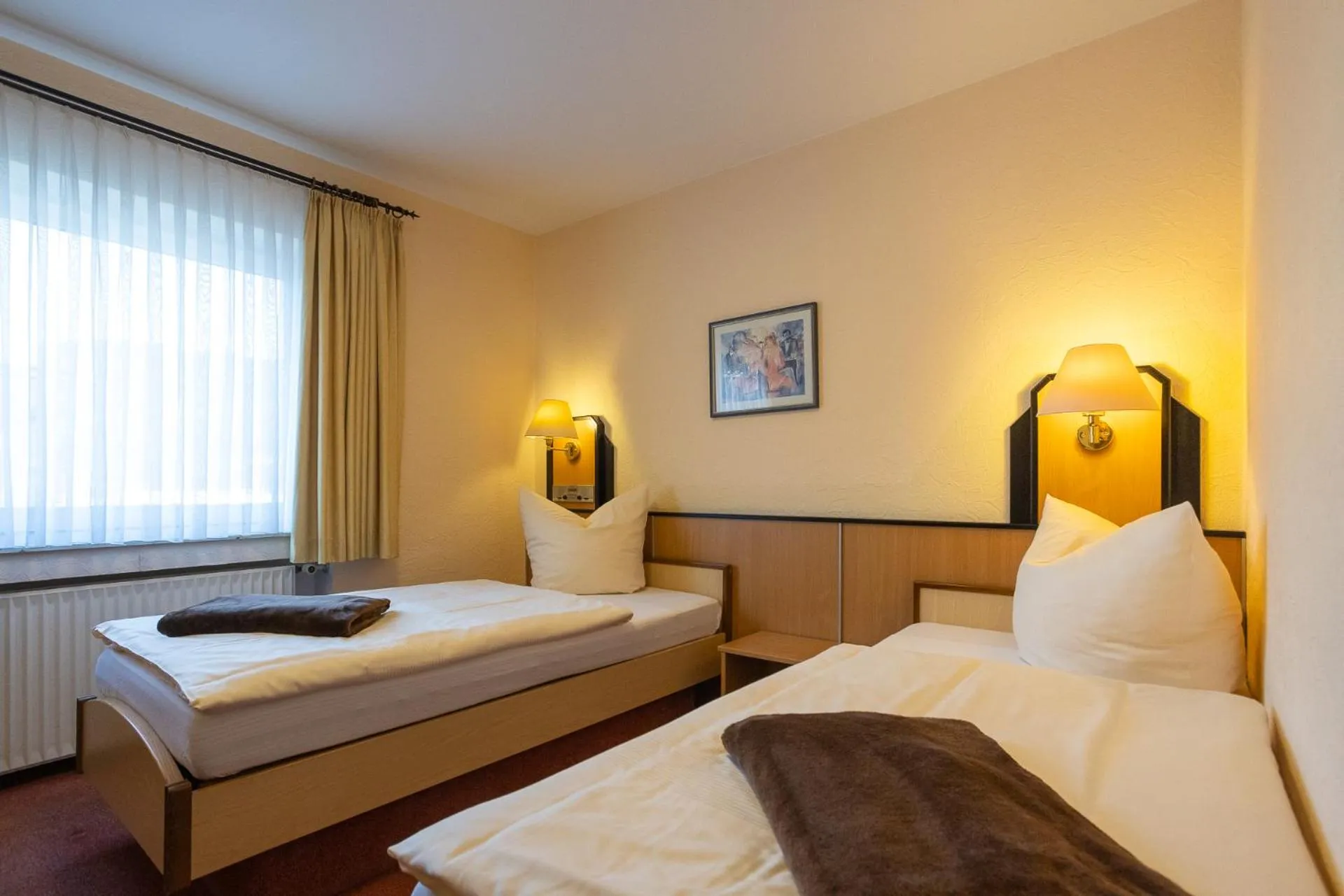 Bed in Stadt-gut-Hotel Siegboot