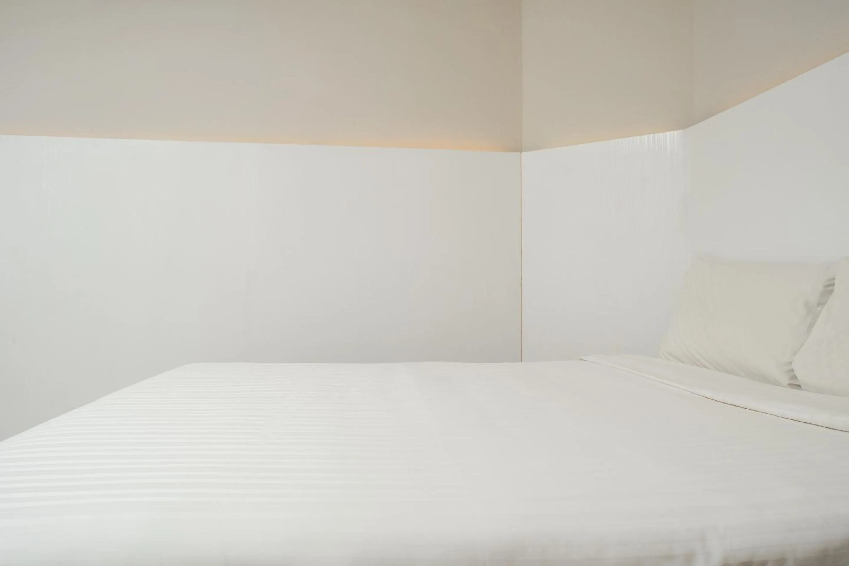 Bedroom in Capital O 90083 Riverfront Inn