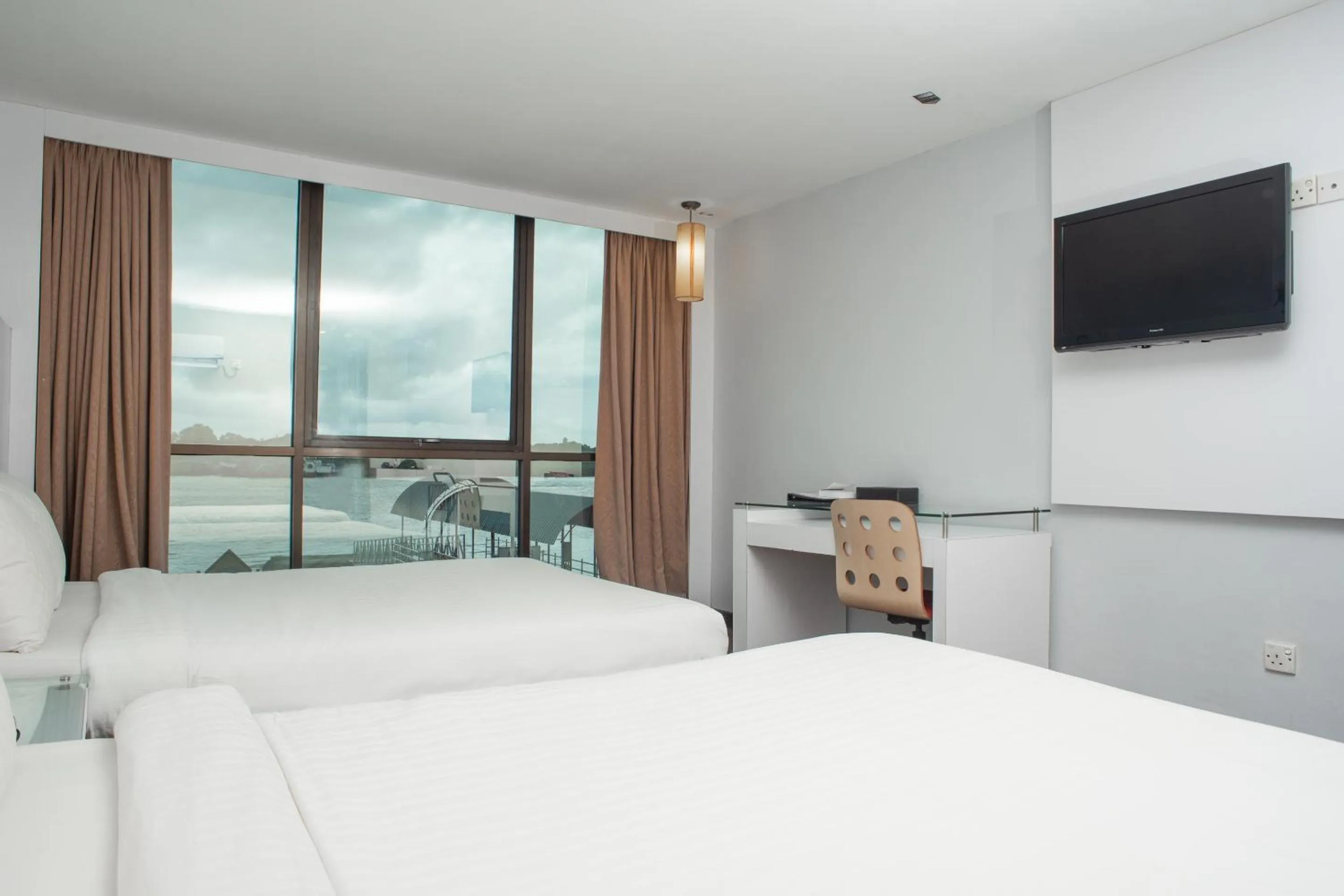 Bed in Capital O 90083 Riverfront Inn