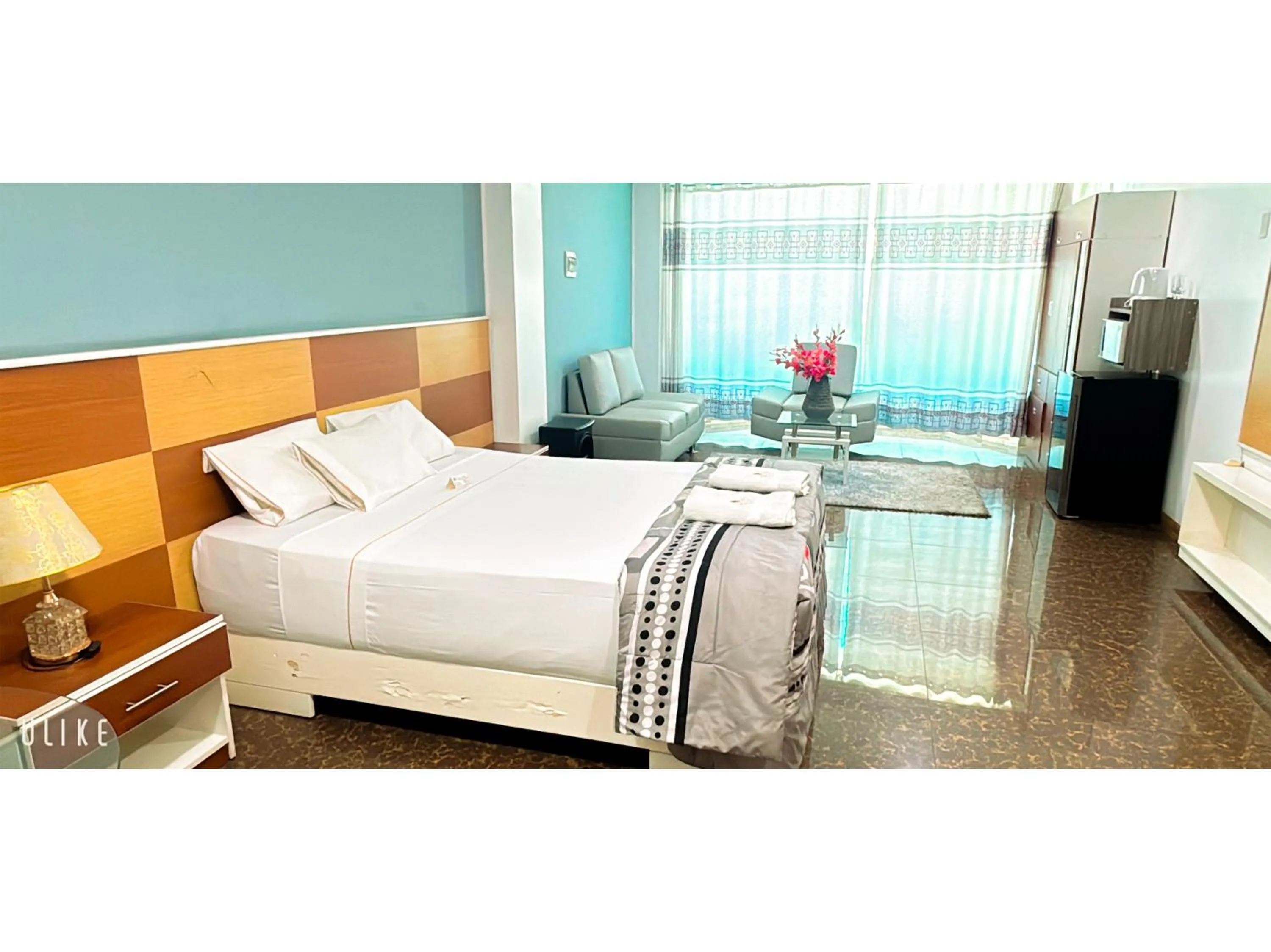 Photo of the whole room, Bed in San Isidro Grand Hotel