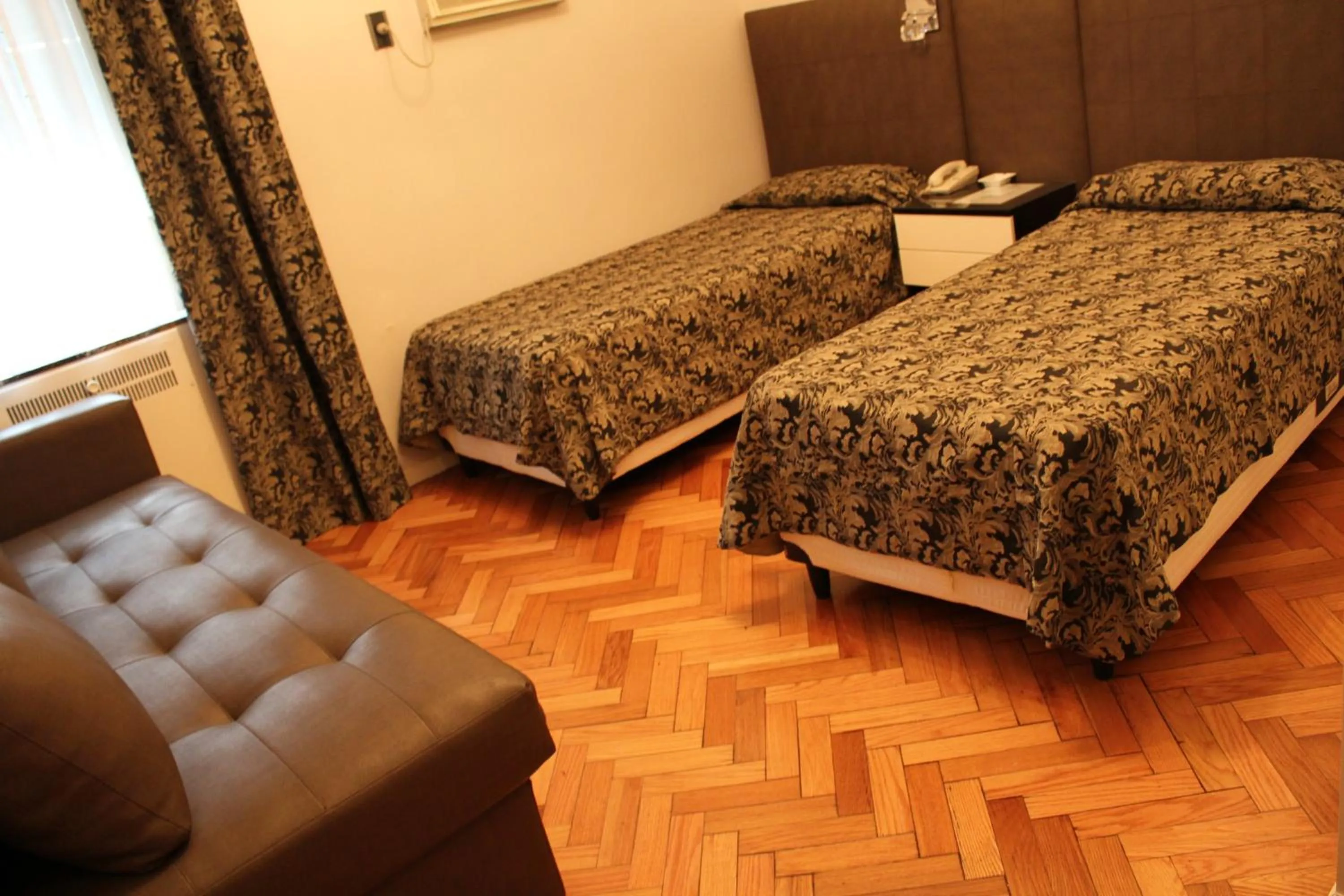 Bed in Ayacucho Palace Hotel