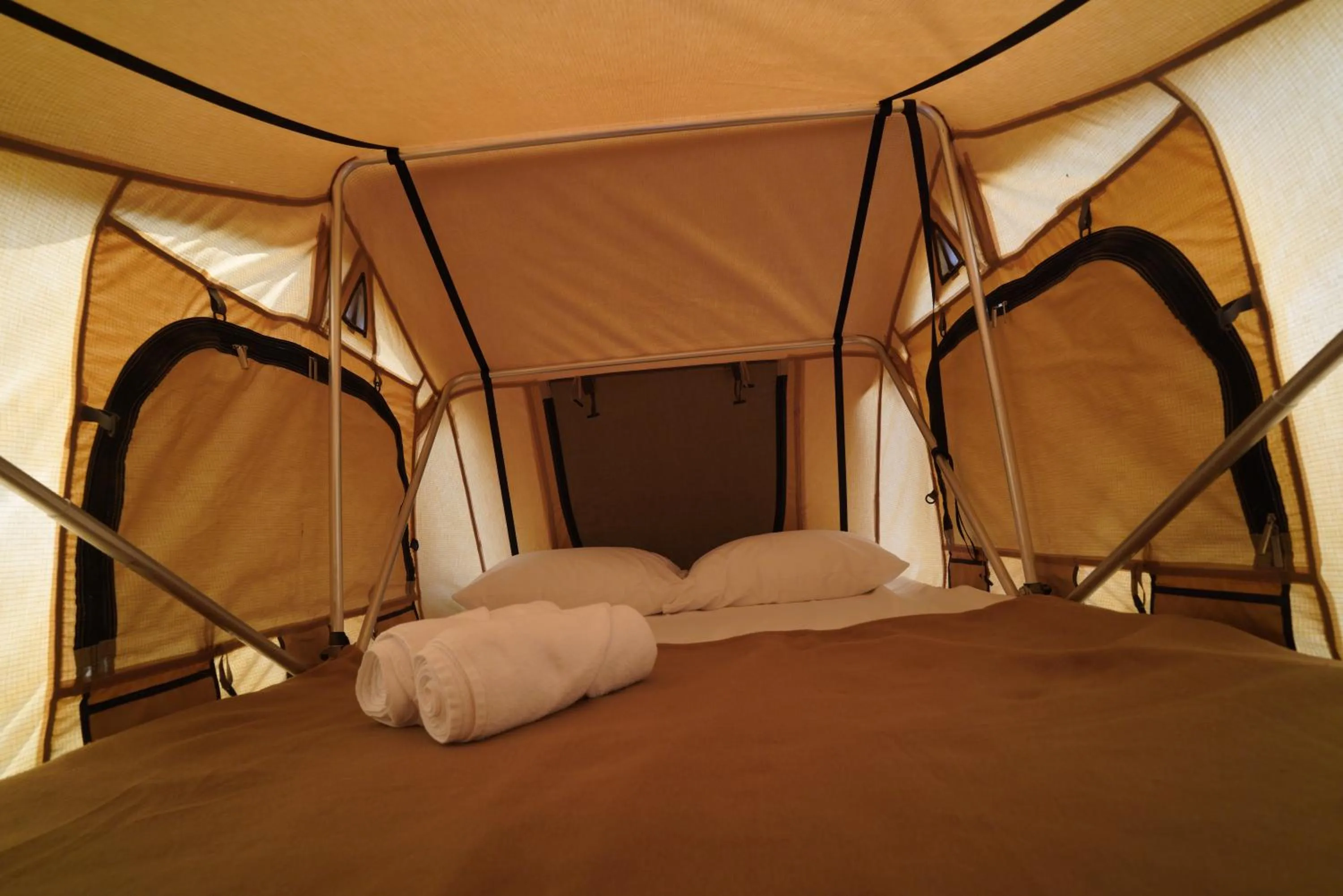 Bed in Bab Al Nojoum Hudayriyat Camp