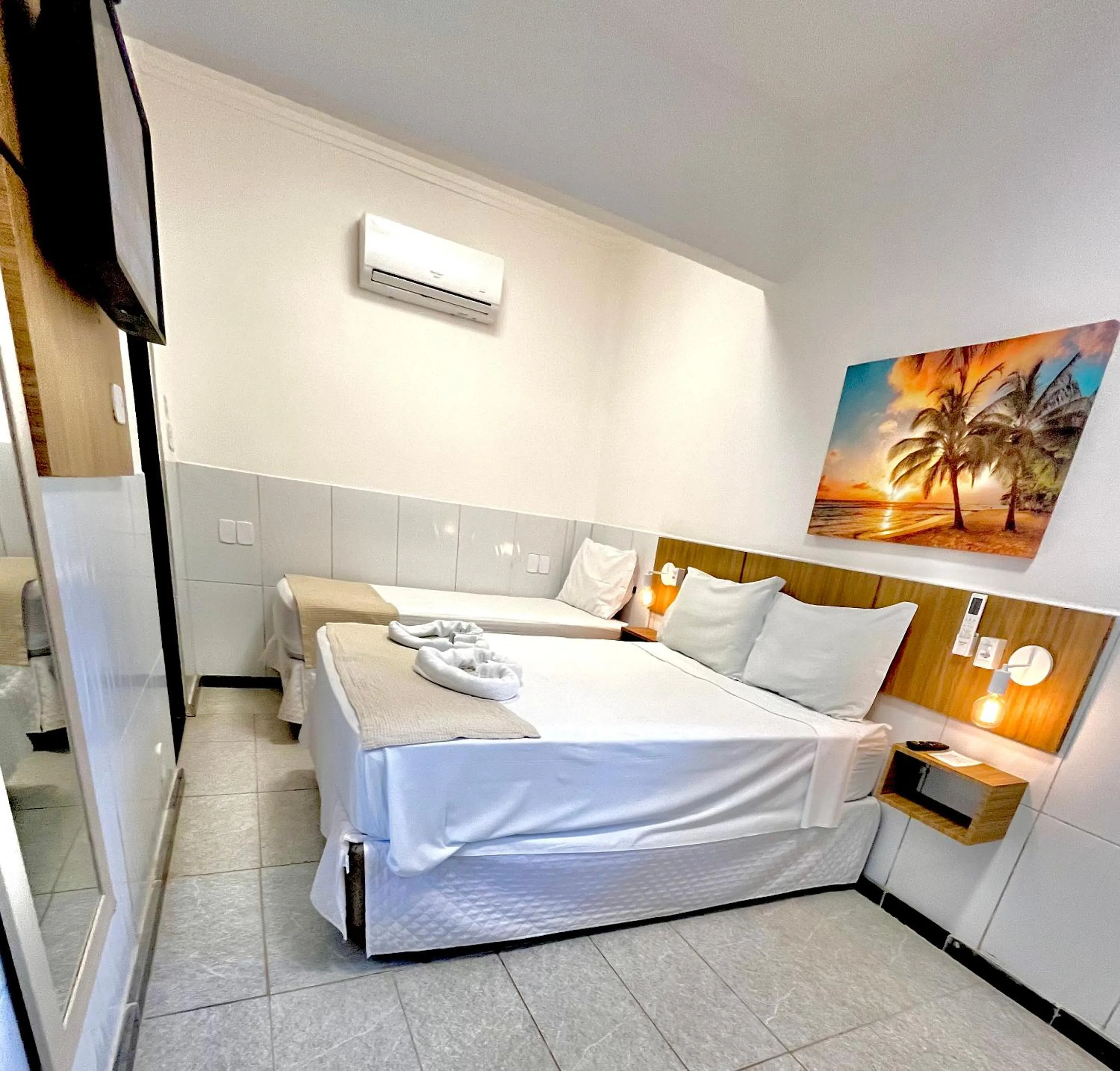 Bed in Pousada La Riviera - Pé na areia e Passeios em Maragogi