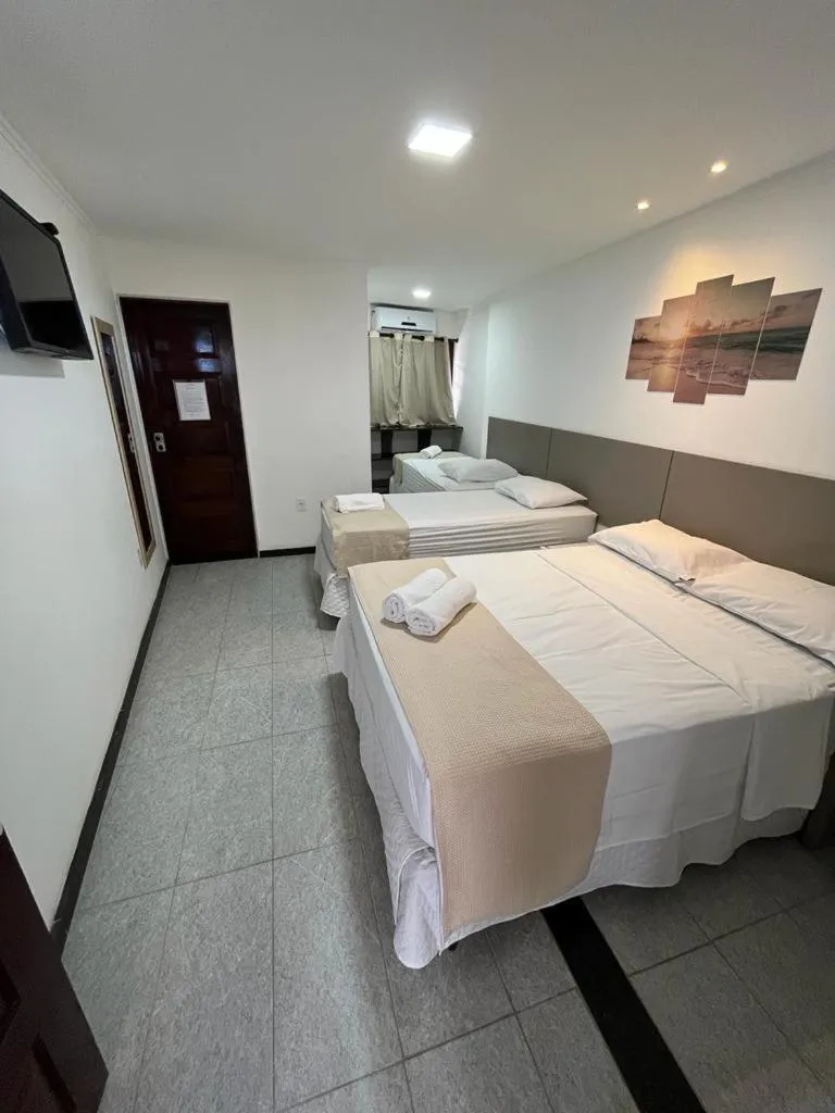 Bed in Pousada La Riviera - Pé na areia e Passeios em Maragogi