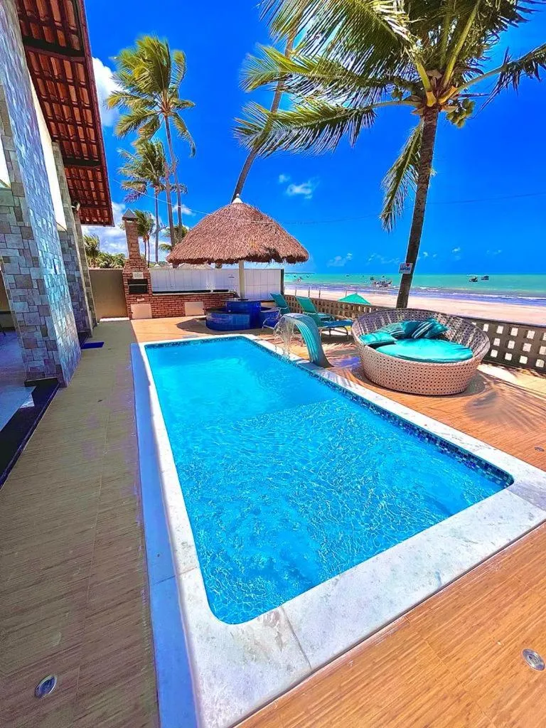 Swimming pool in Pousada La Riviera - Pé na areia e Passeios em Maragogi