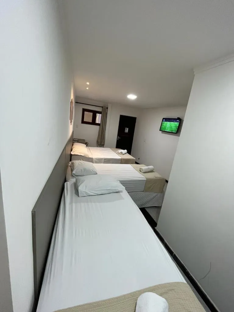 Bed in Pousada La Riviera - Pé na areia e Passeios em Maragogi