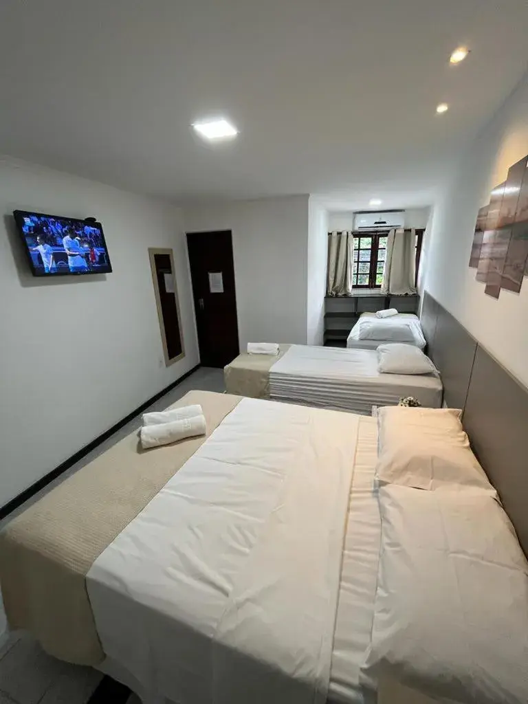 Quadruple Room with Private Bathroom in Pousada La Riviera - Pé na areia e Passeios em Maragogi Quadruple Room with Private Bathroom in Pousada La Riviera - Pé na areia e Passeios em Maragogi