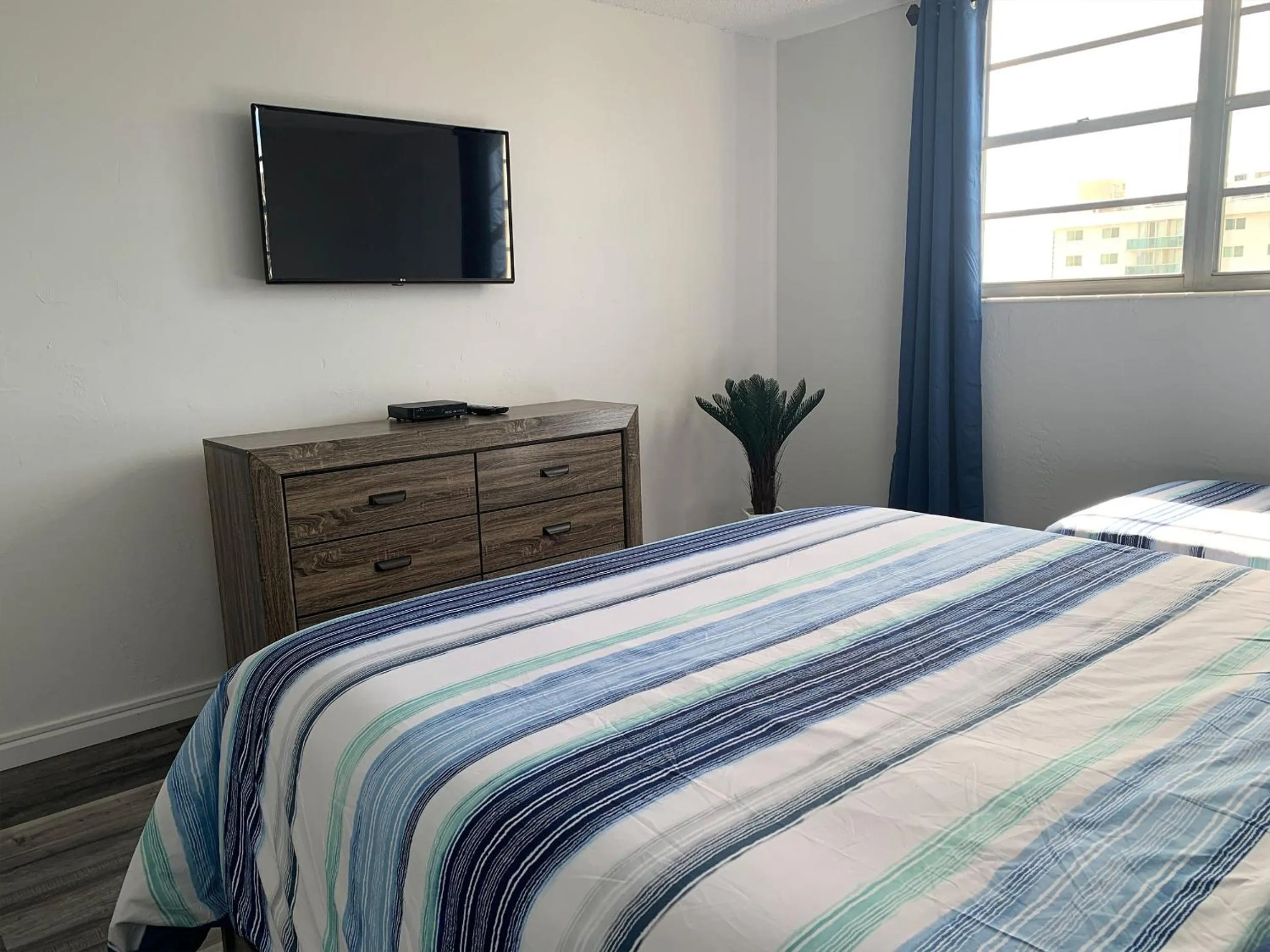 Bed in Beach Apartment at Condo-hotel