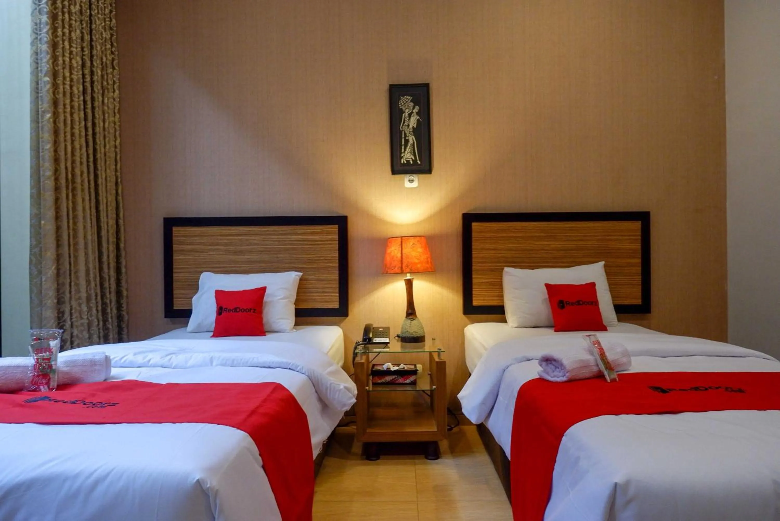 Bed in RedDoorz Plus near Amplaz Yogyakarta