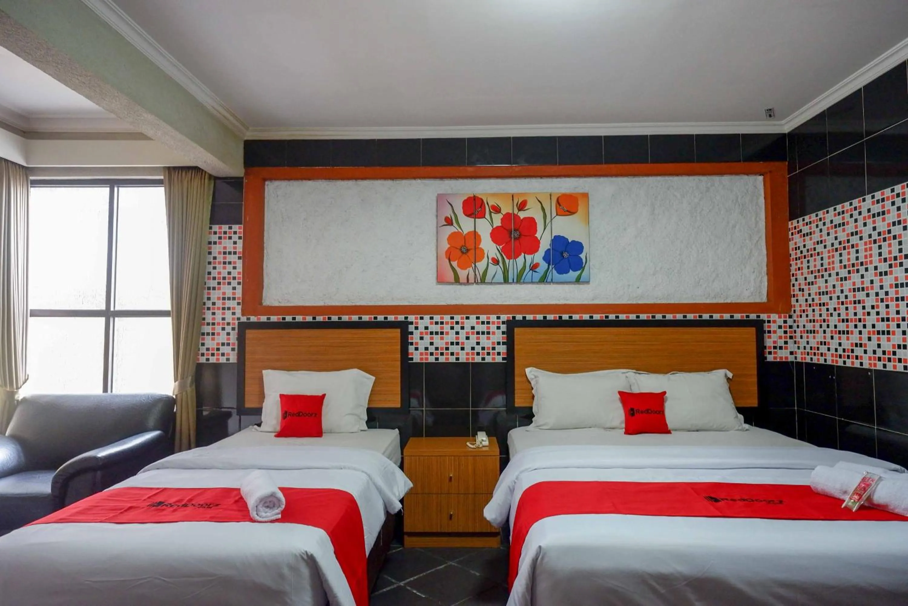 Bed in RedDoorz Plus near Amplaz Yogyakarta