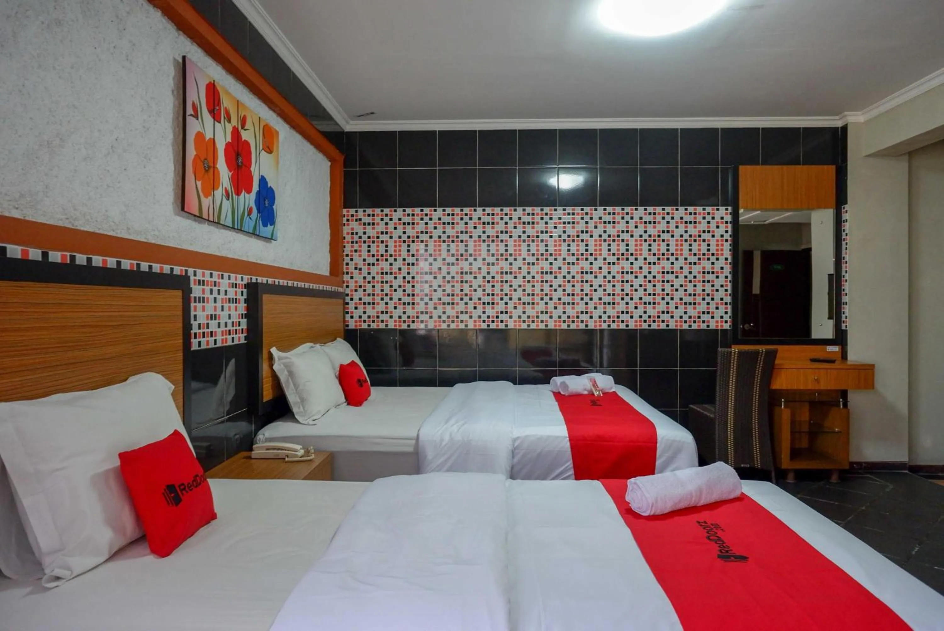Bed in RedDoorz Plus near Amplaz Yogyakarta