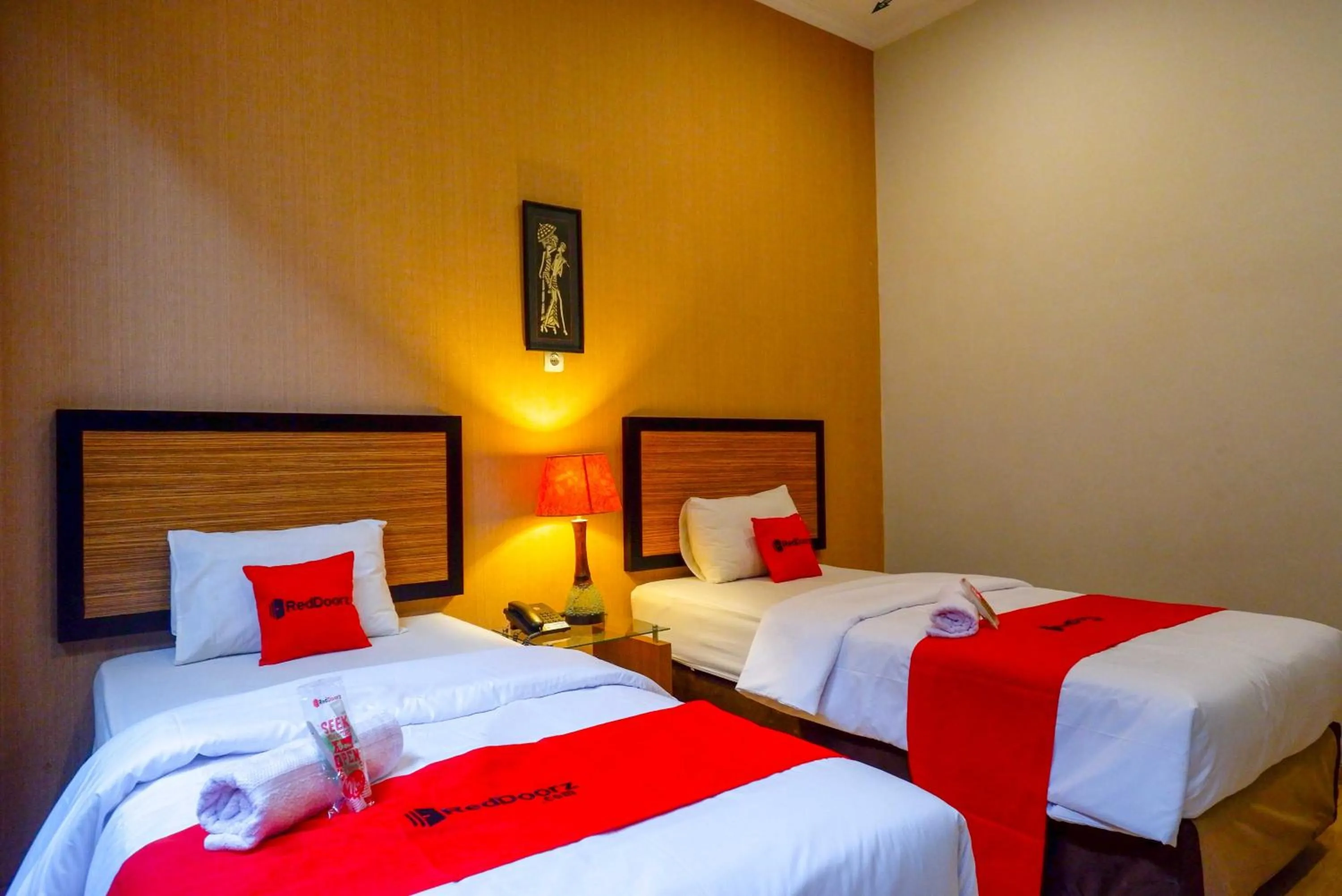 Bed in RedDoorz Plus near Amplaz Yogyakarta