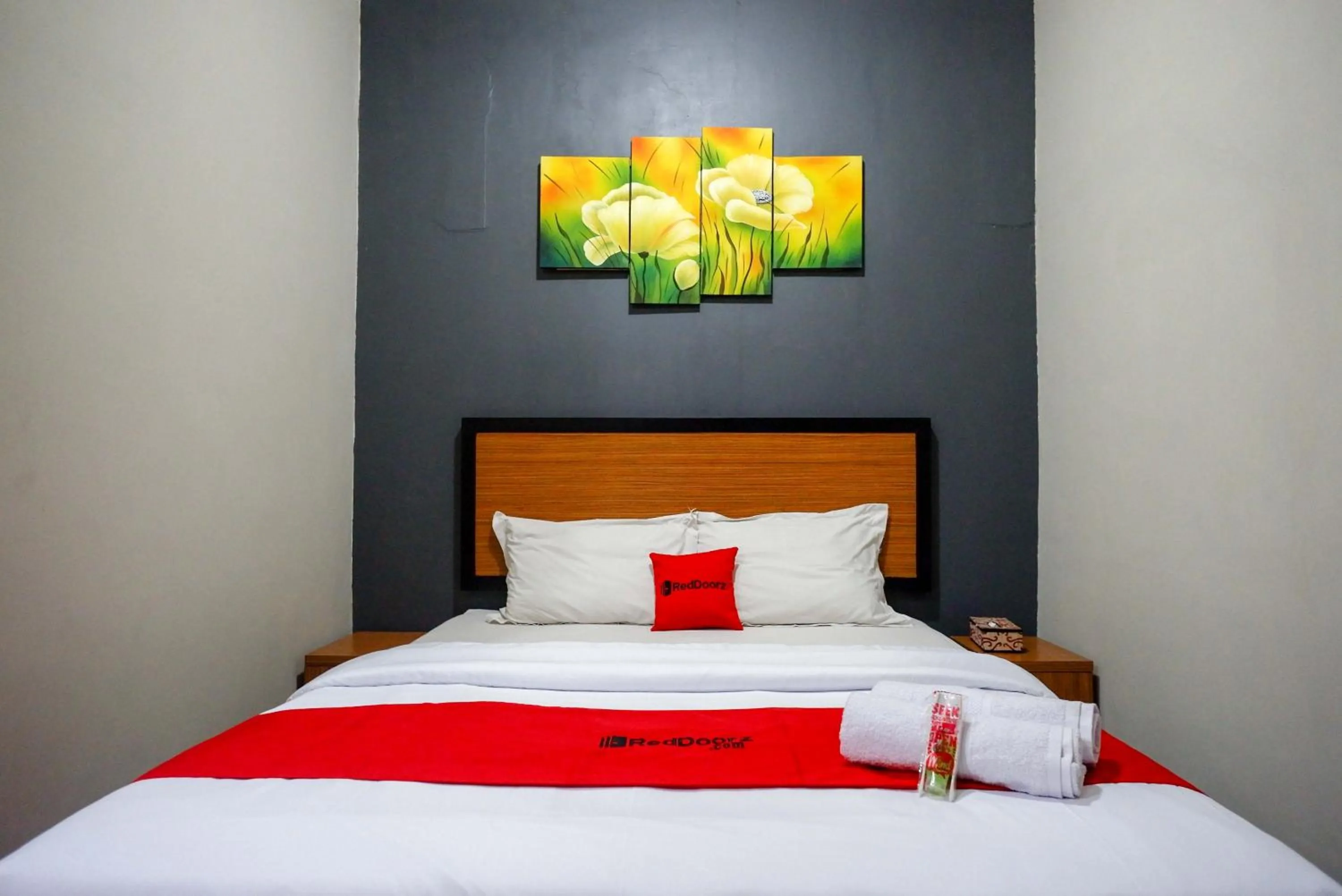Bed in RedDoorz Plus near Amplaz Yogyakarta