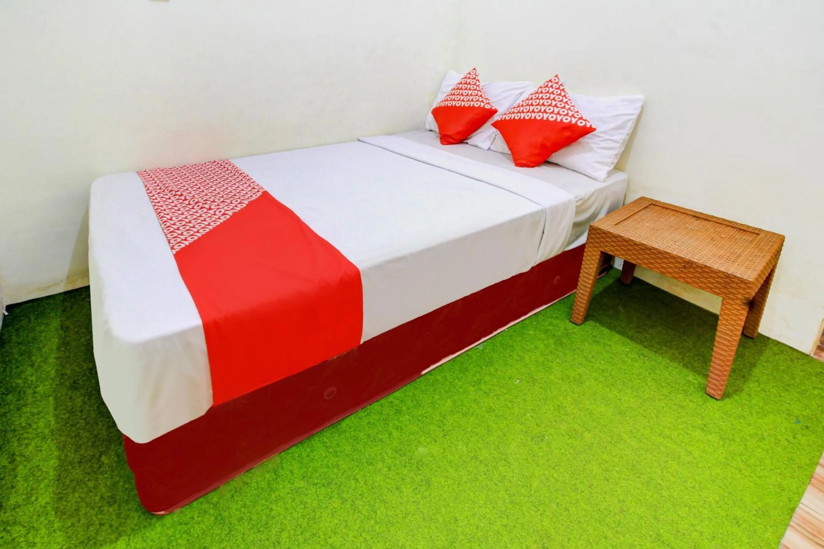 Bedroom in Hotel O Zeevanna Guest House Syariah