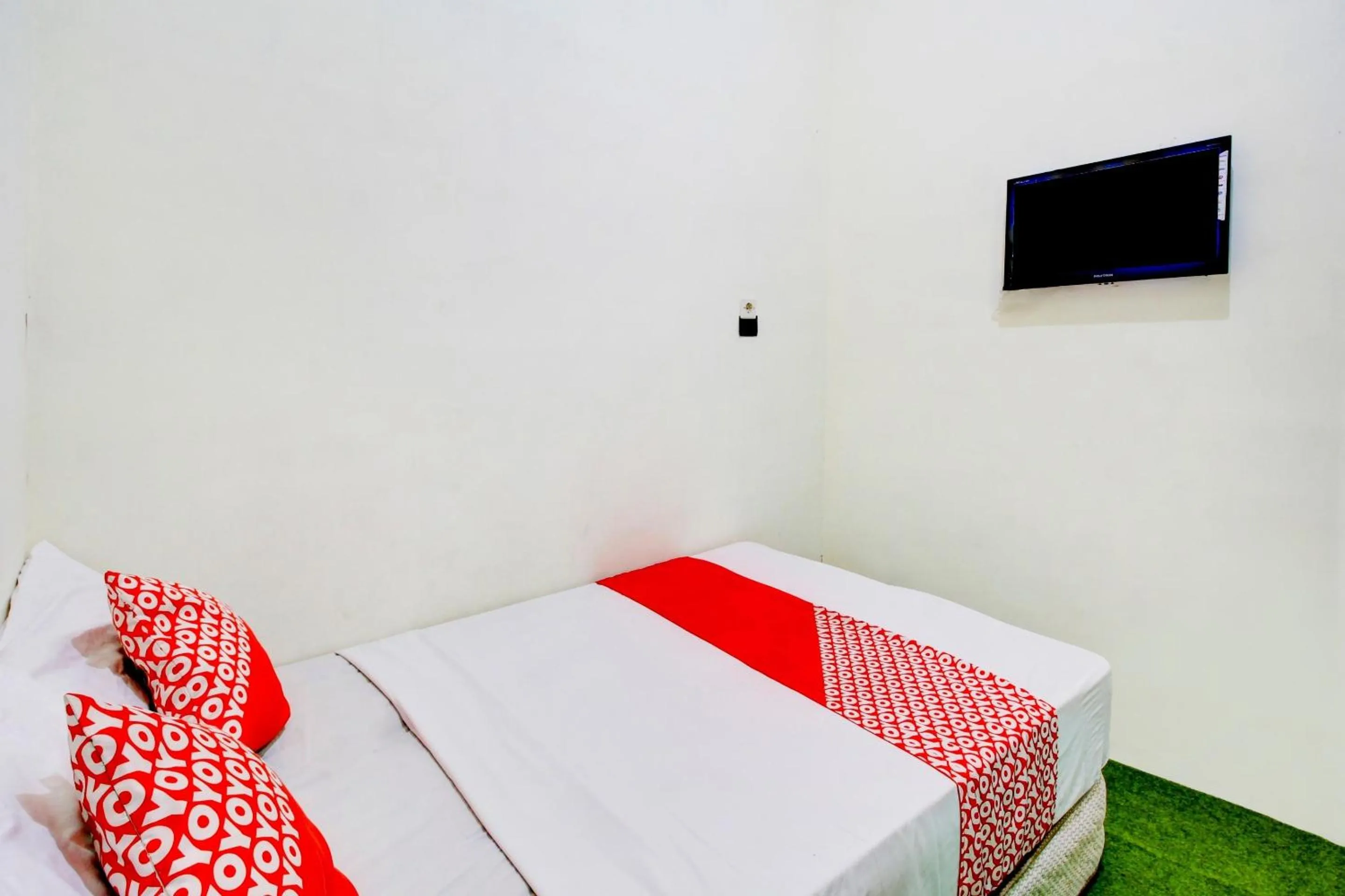 Bedroom in Hotel O Zeevanna Guest House Syariah