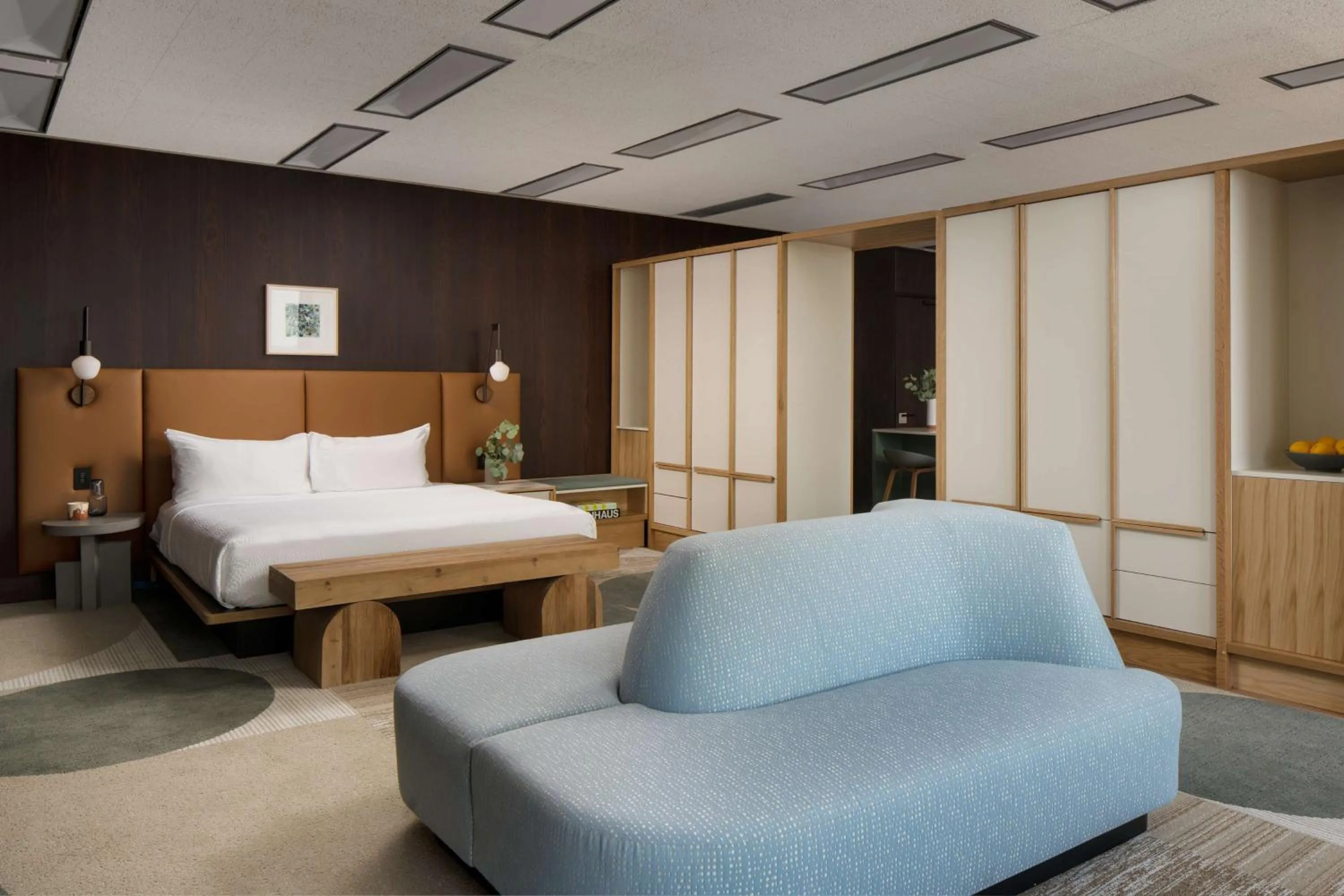 Living room, Bed in Hotel Marcel New Haven, Tapestry Collection By Hilton