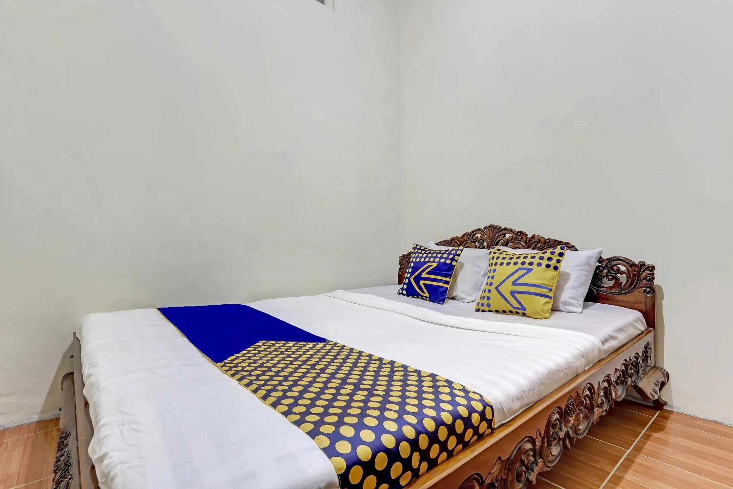 Bedroom, Bed in Hotel O Alika Homestay