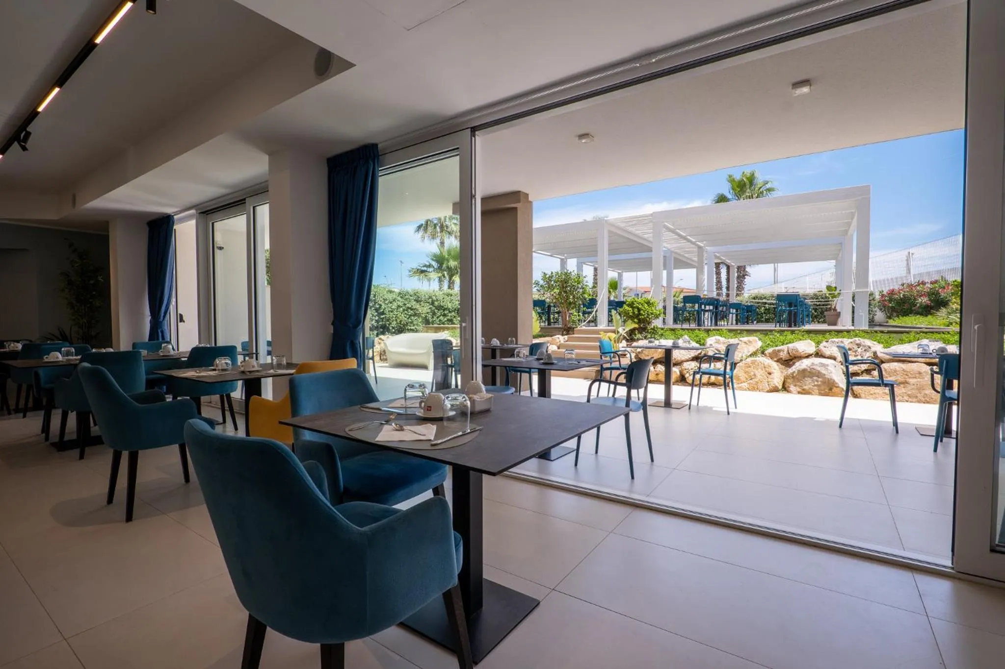 Patio in Resort La Battigia Beach & Spa