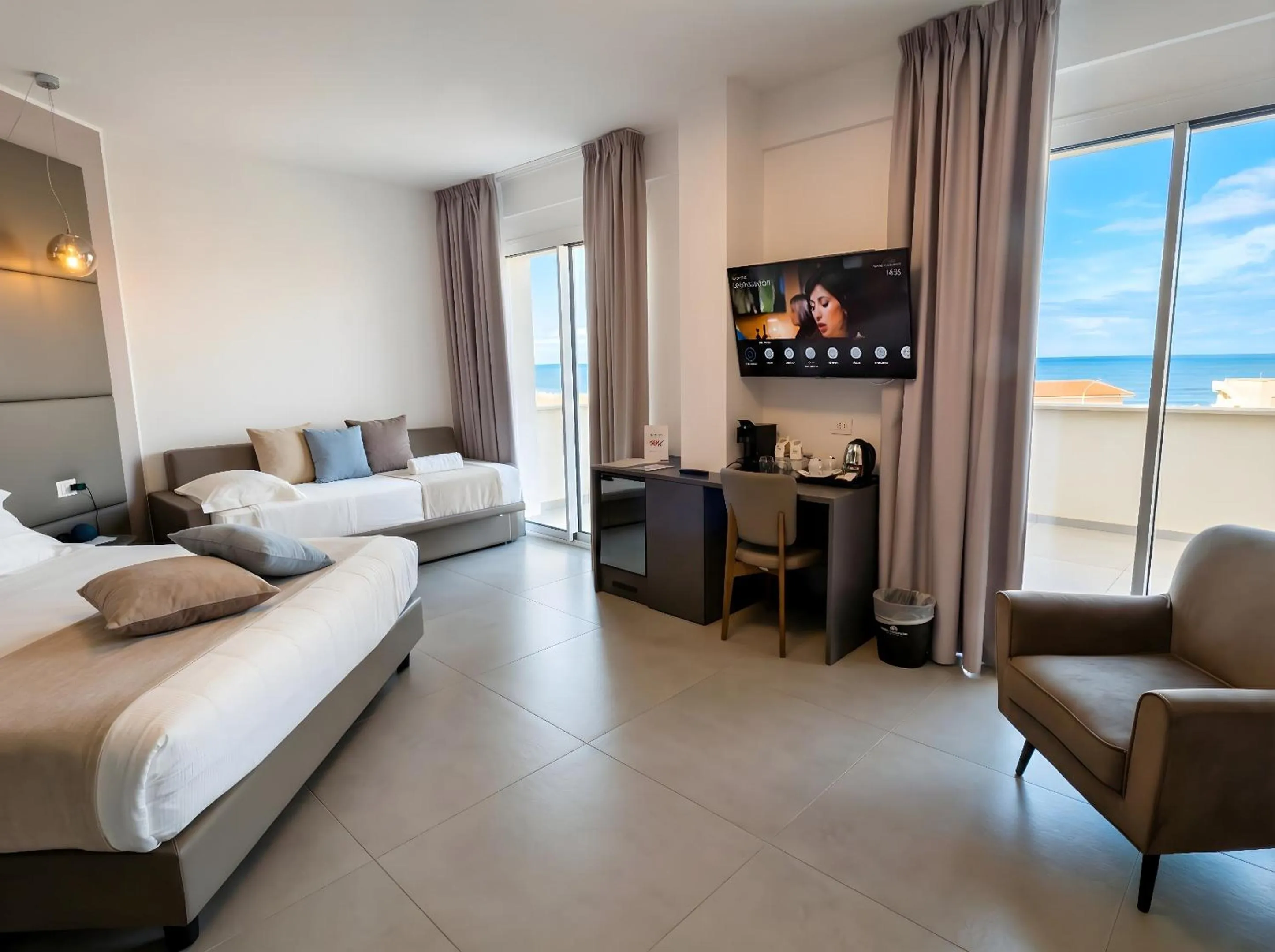 Bed in Resort La Battigia Beach & Spa