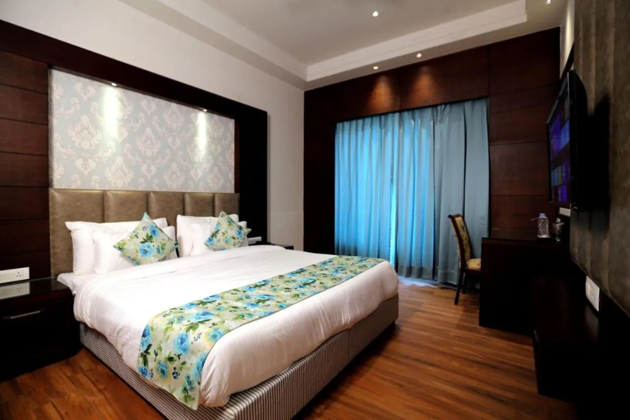 Bed in The Stella Hotel & Resort