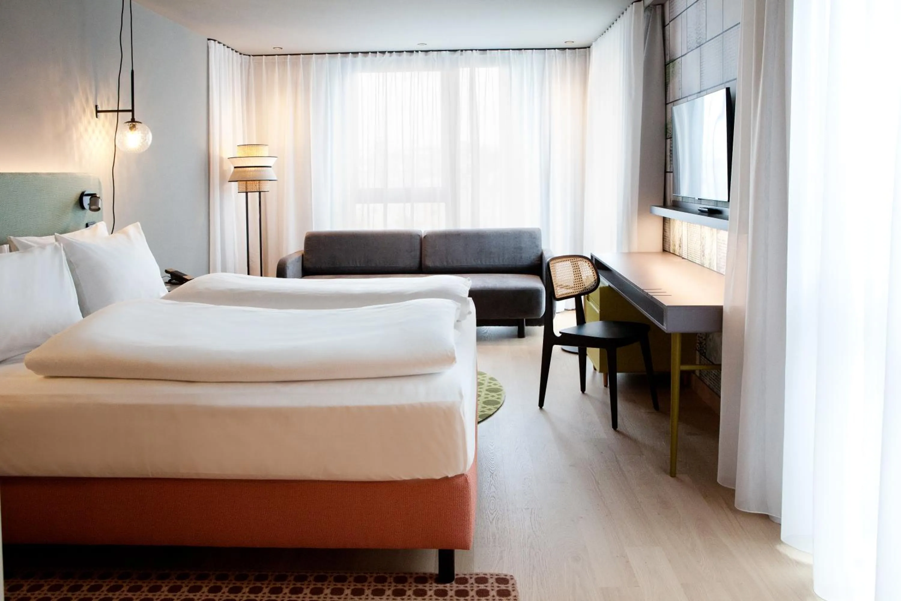Photo of the whole room, Bed in Hotel Indigo Vienna - Naschmarkt by IHG