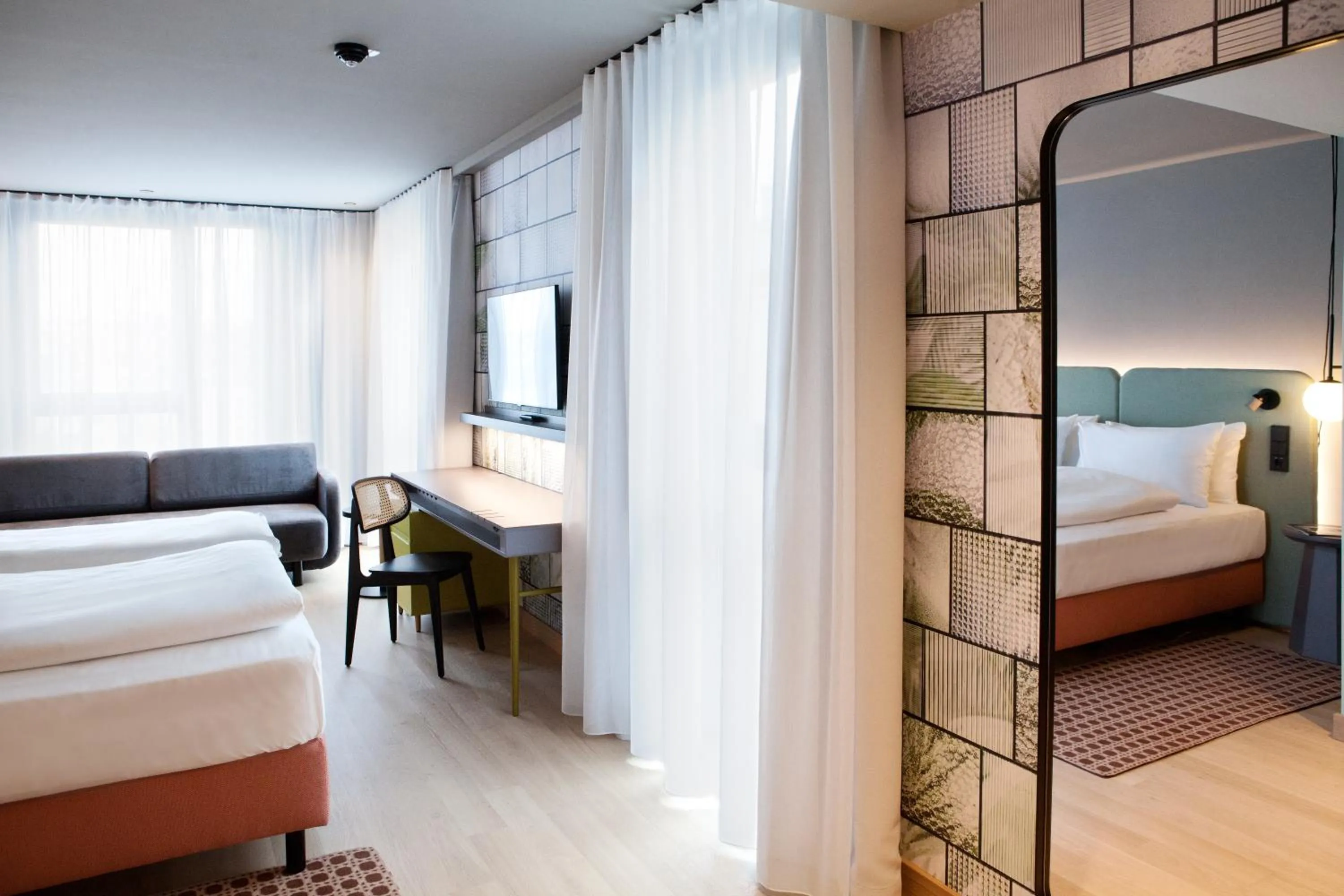 Photo of the whole room, Bed in Hotel Indigo Vienna - Naschmarkt by IHG