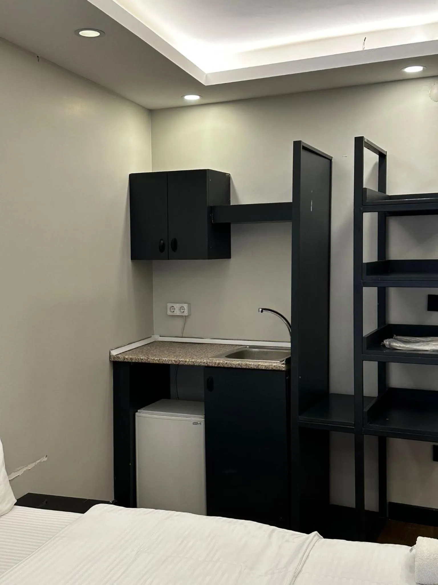 Communal lounge/ TV room, Bed in Istanbul Taksim Galata Tower King Suites and Hotel