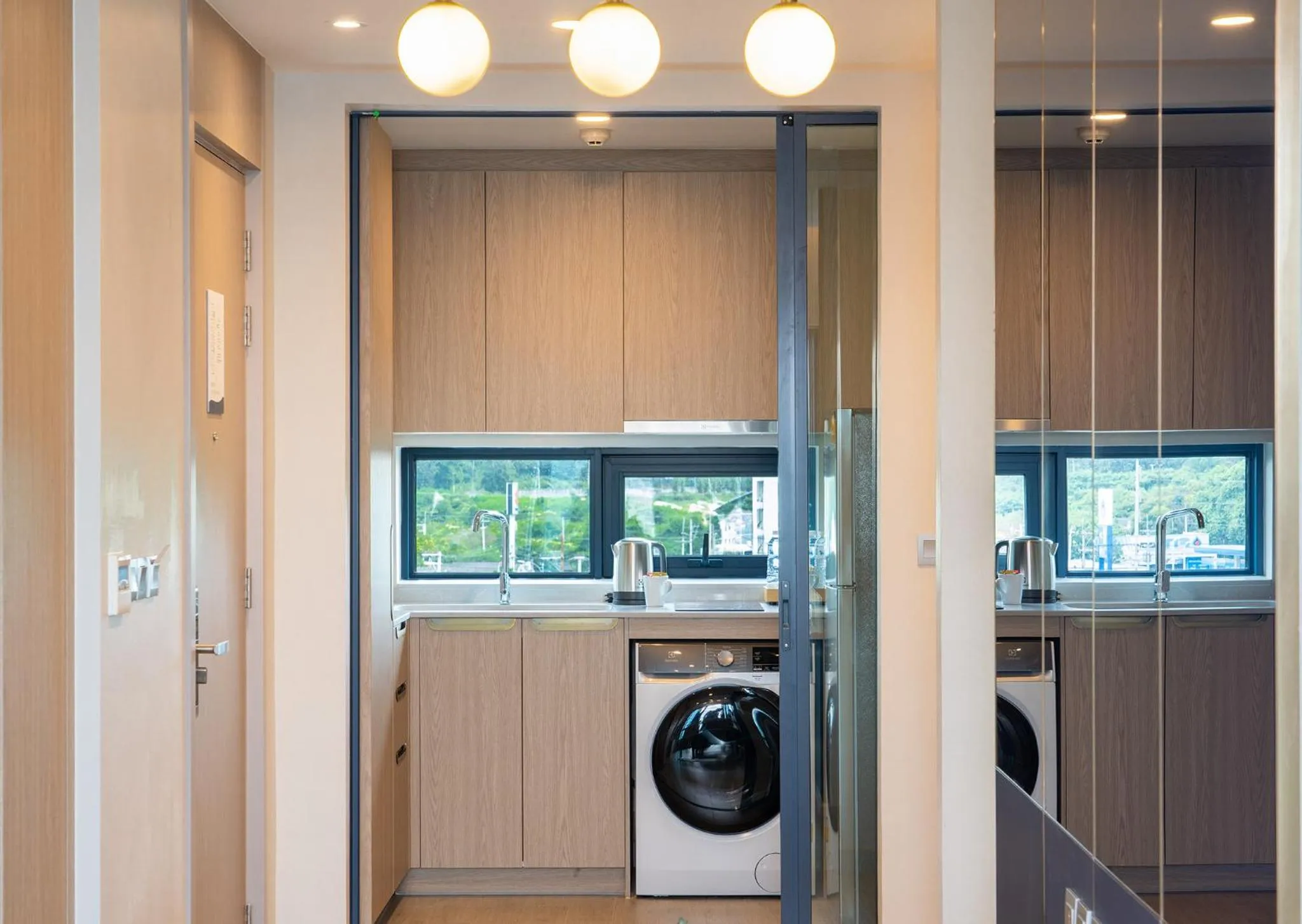 Kitchen or kitchenette in S Sriracha Hotel & Residence