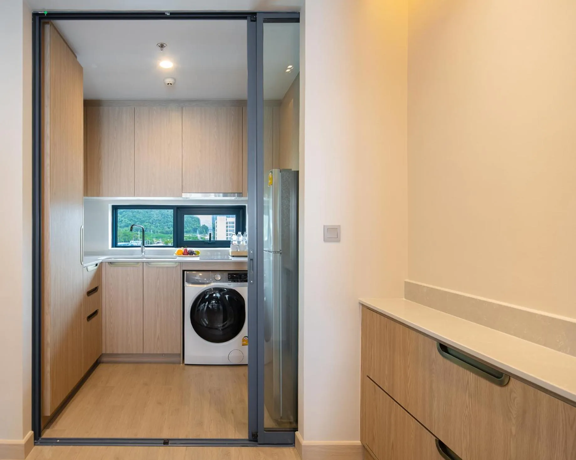 Kitchen or kitchenette in S Sriracha Hotel & Residence