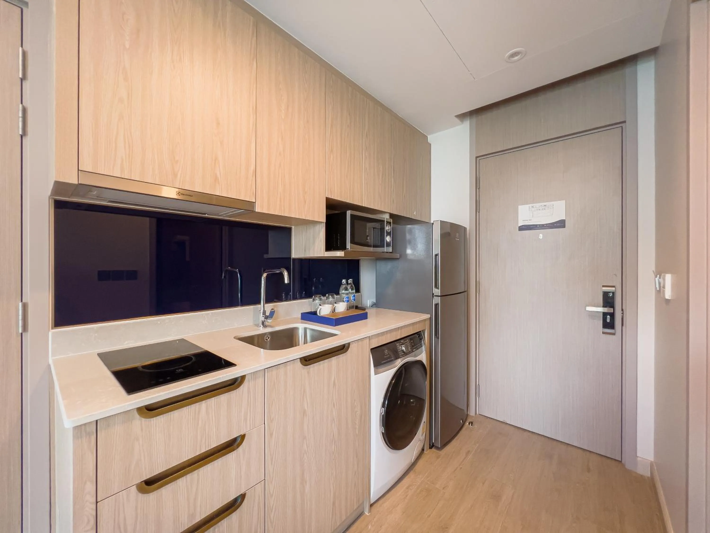 Kitchen or kitchenette in S Sriracha Hotel & Residence