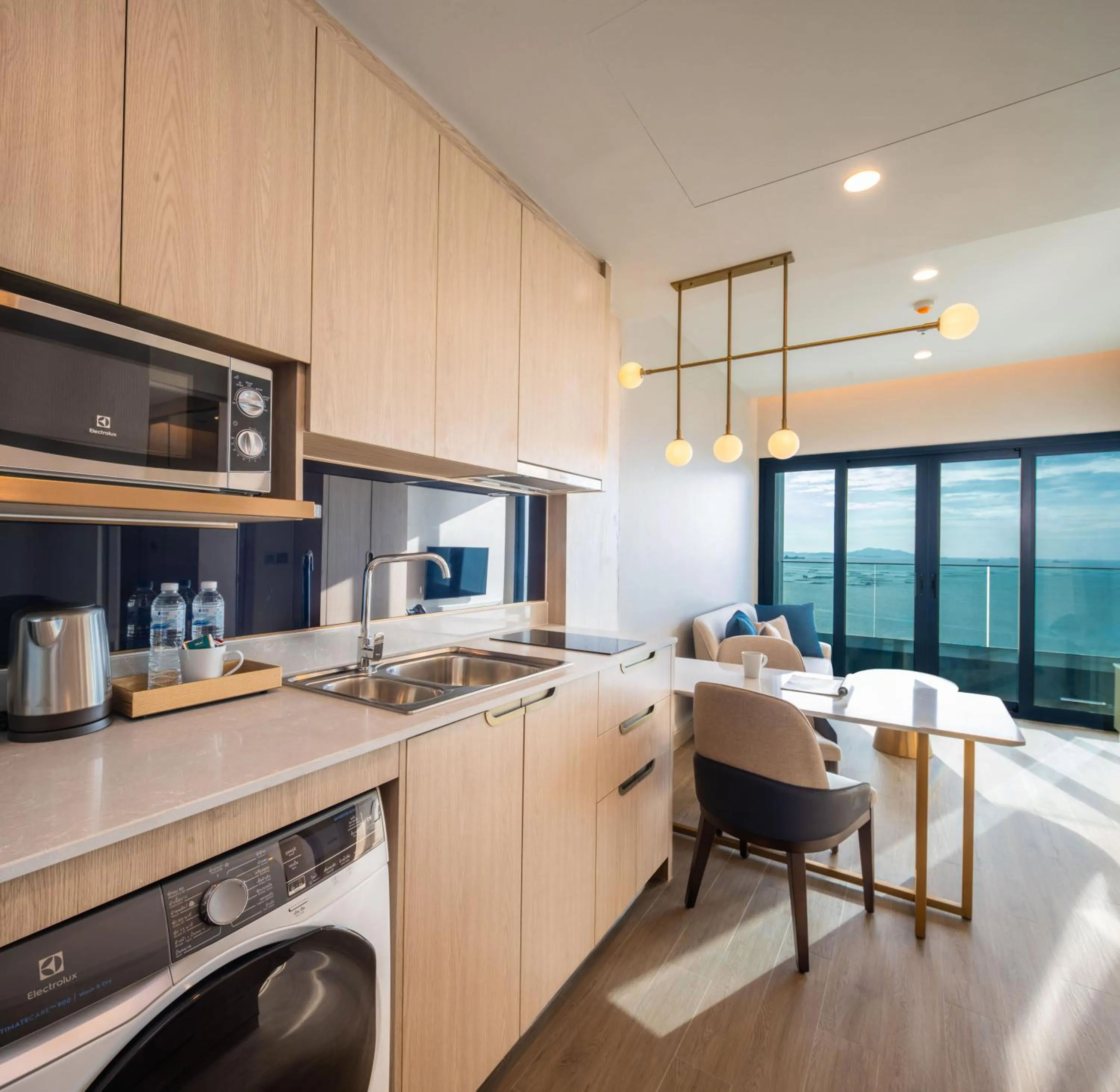 Kitchen or kitchenette in S Sriracha Hotel & Residence