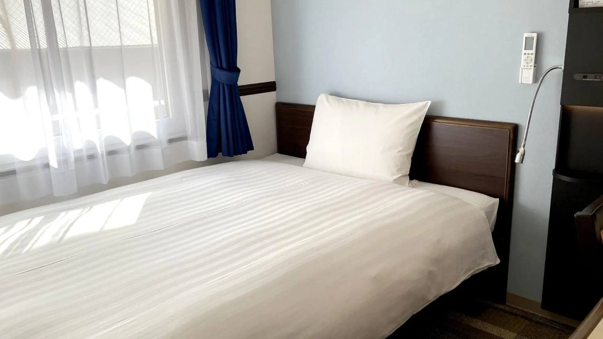 Bedroom, Bed in Toyoko Inn Okayama eki Higashi guchi