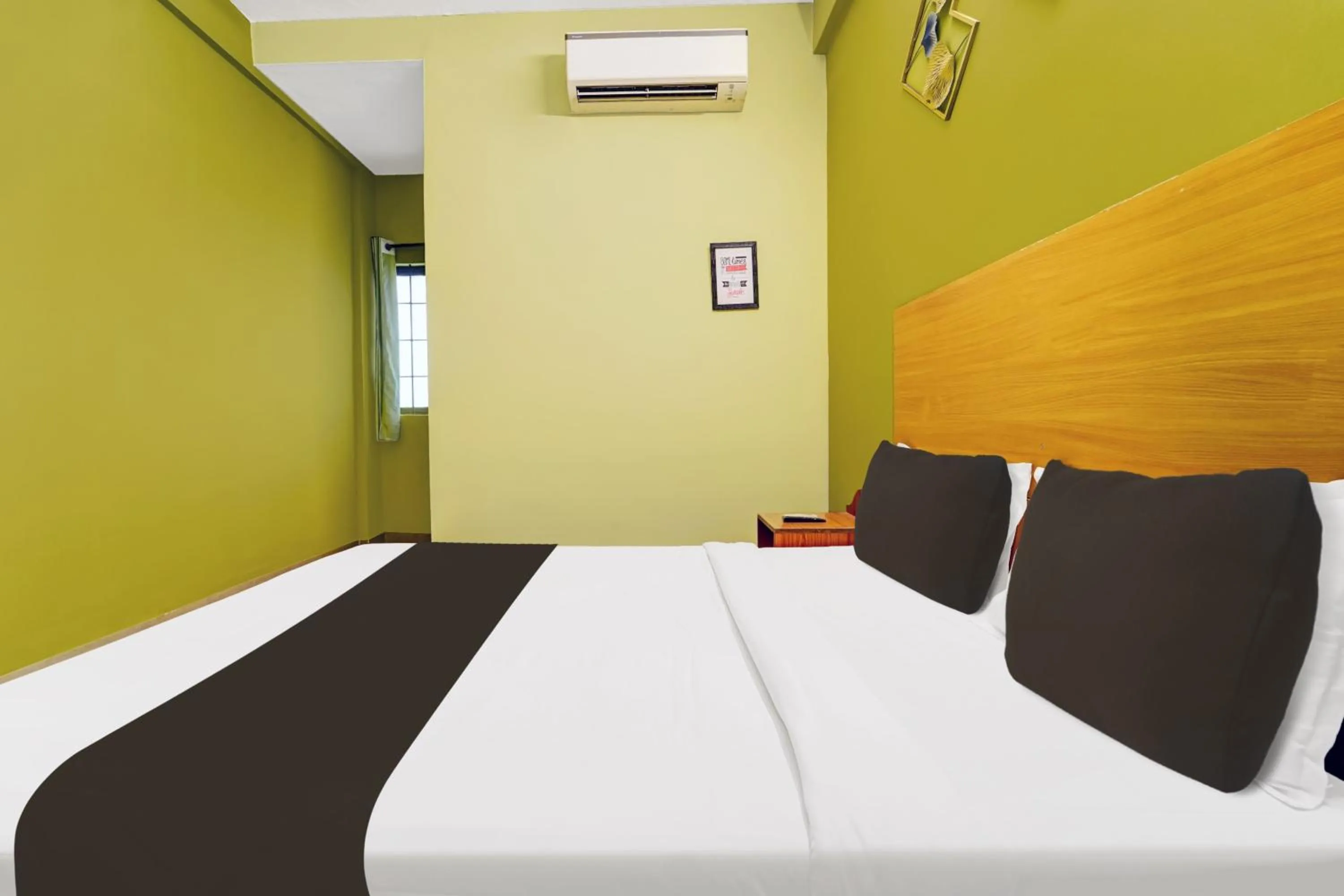 Bedroom in Hotel O Magical Crown Inn