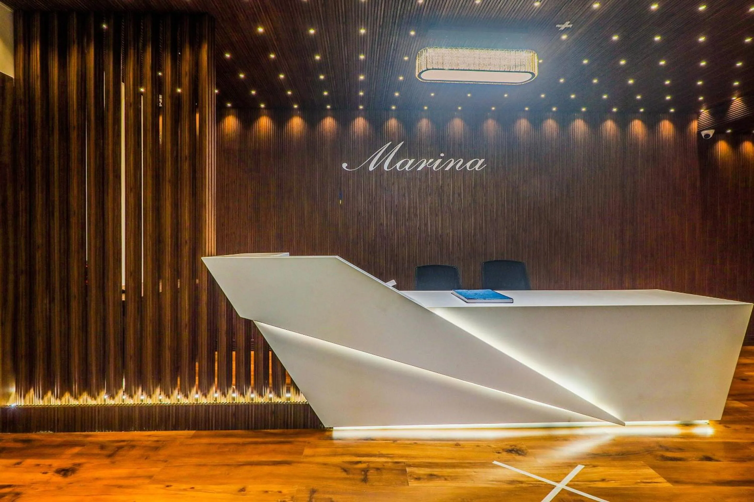 Lobby or reception in Super Townhouse Marina