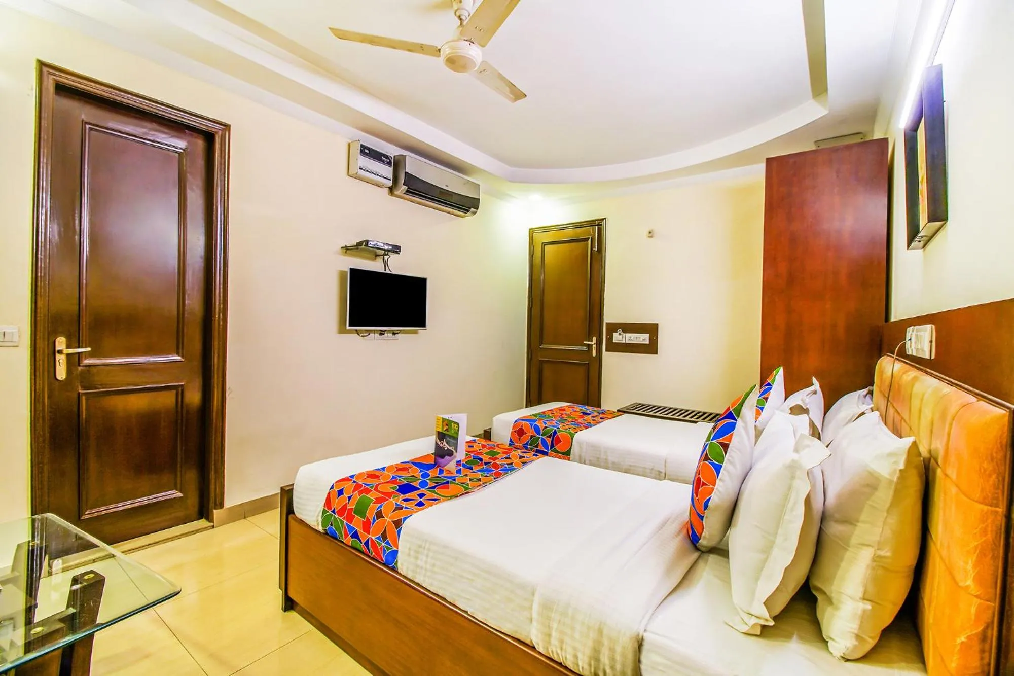 Bed in FabHotel Signature Plaza