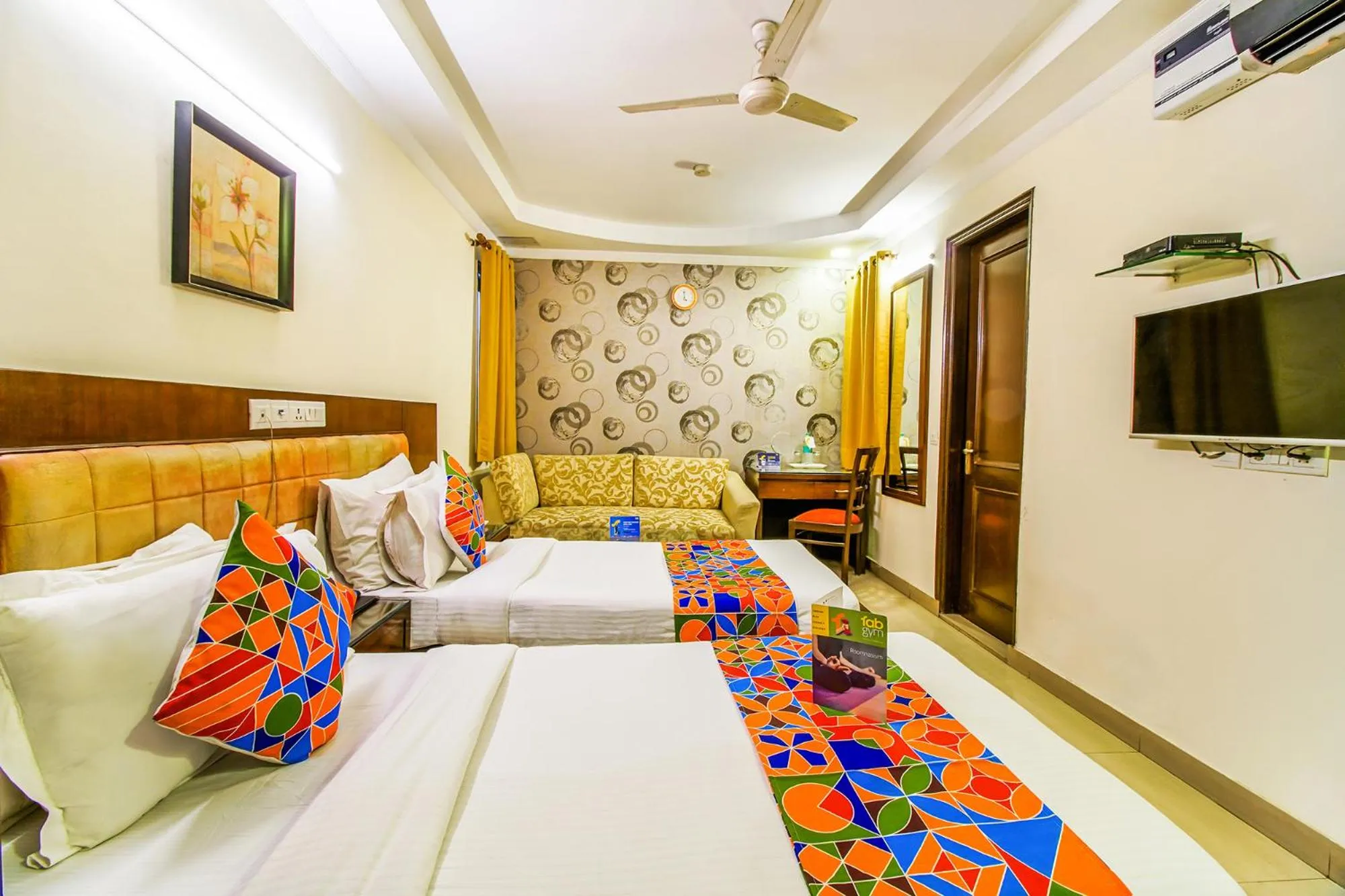 Bed in FabHotel Signature Plaza