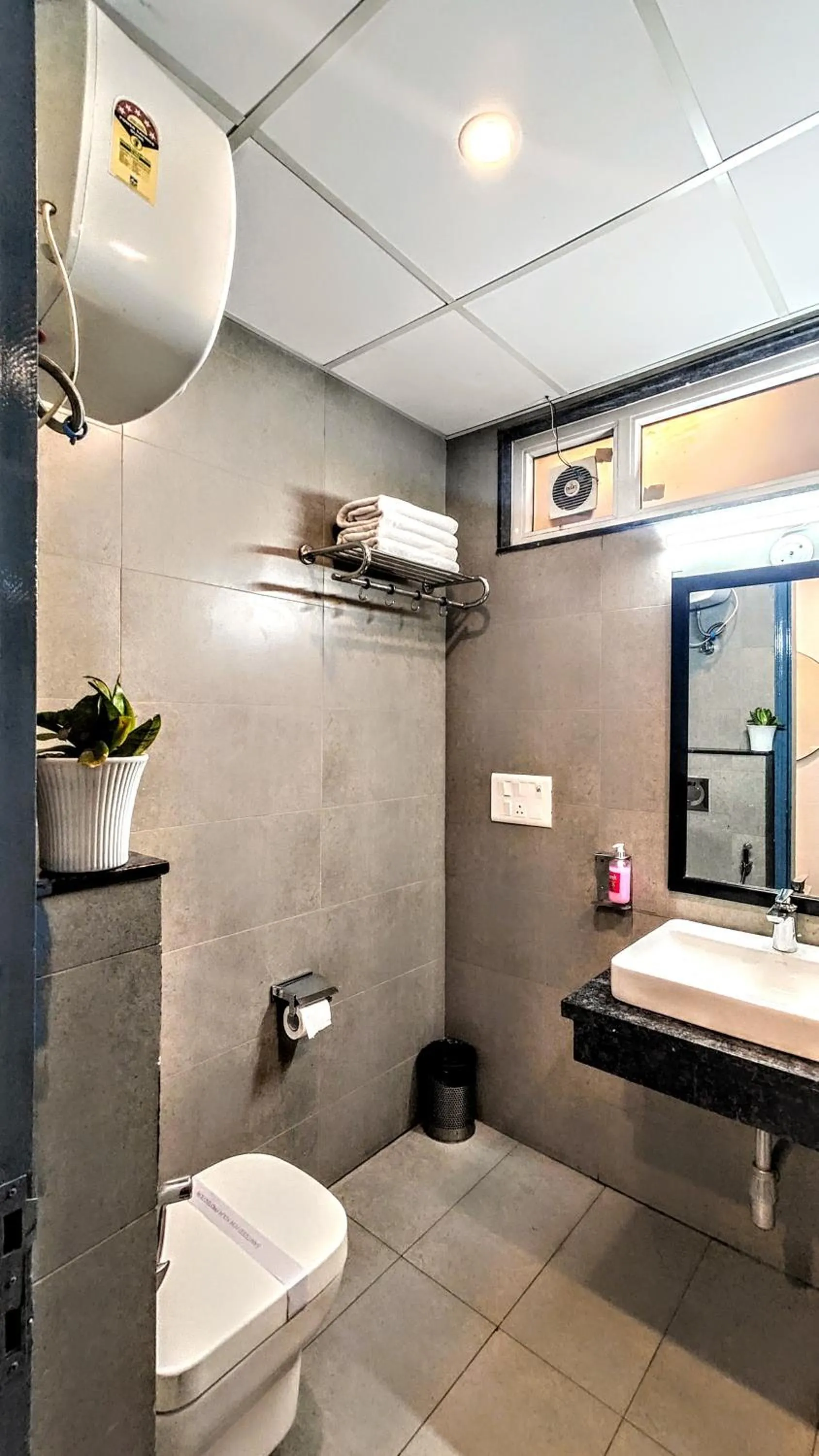 Bathroom in Hotel Mavens White Artemis Hospital Road Sector 52 Gurgaon