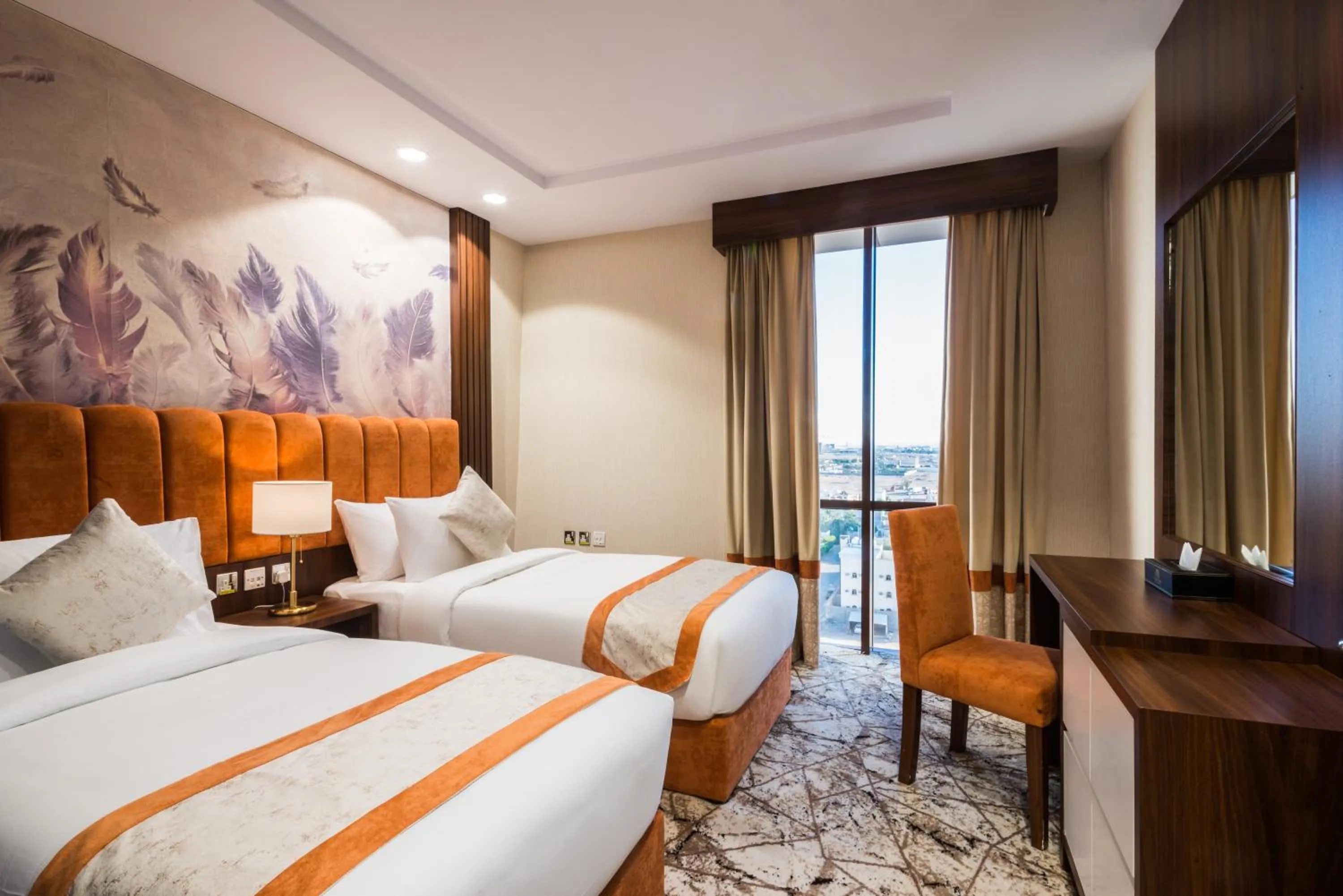 Bed in Tulip Plaza Hotel