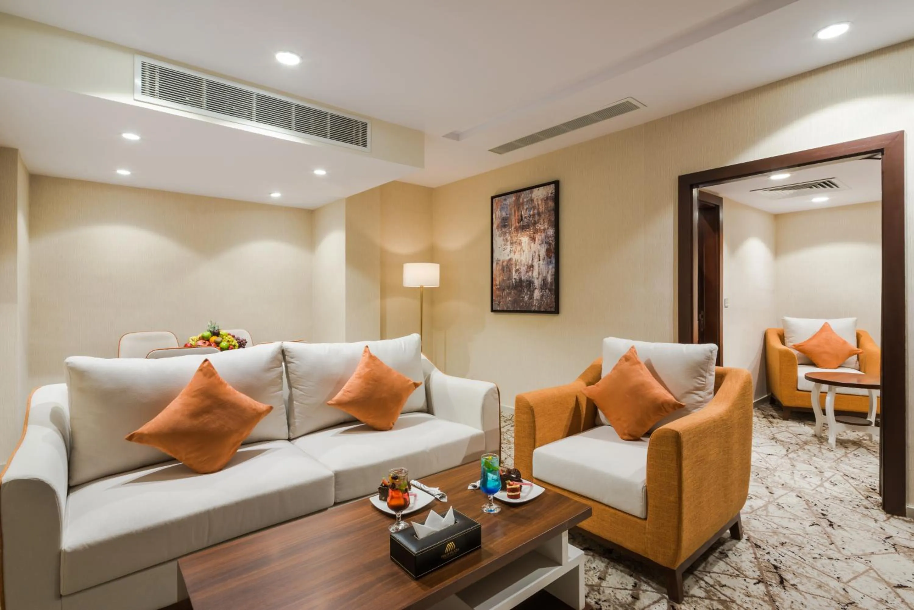 Living room in Tulip Plaza Hotel