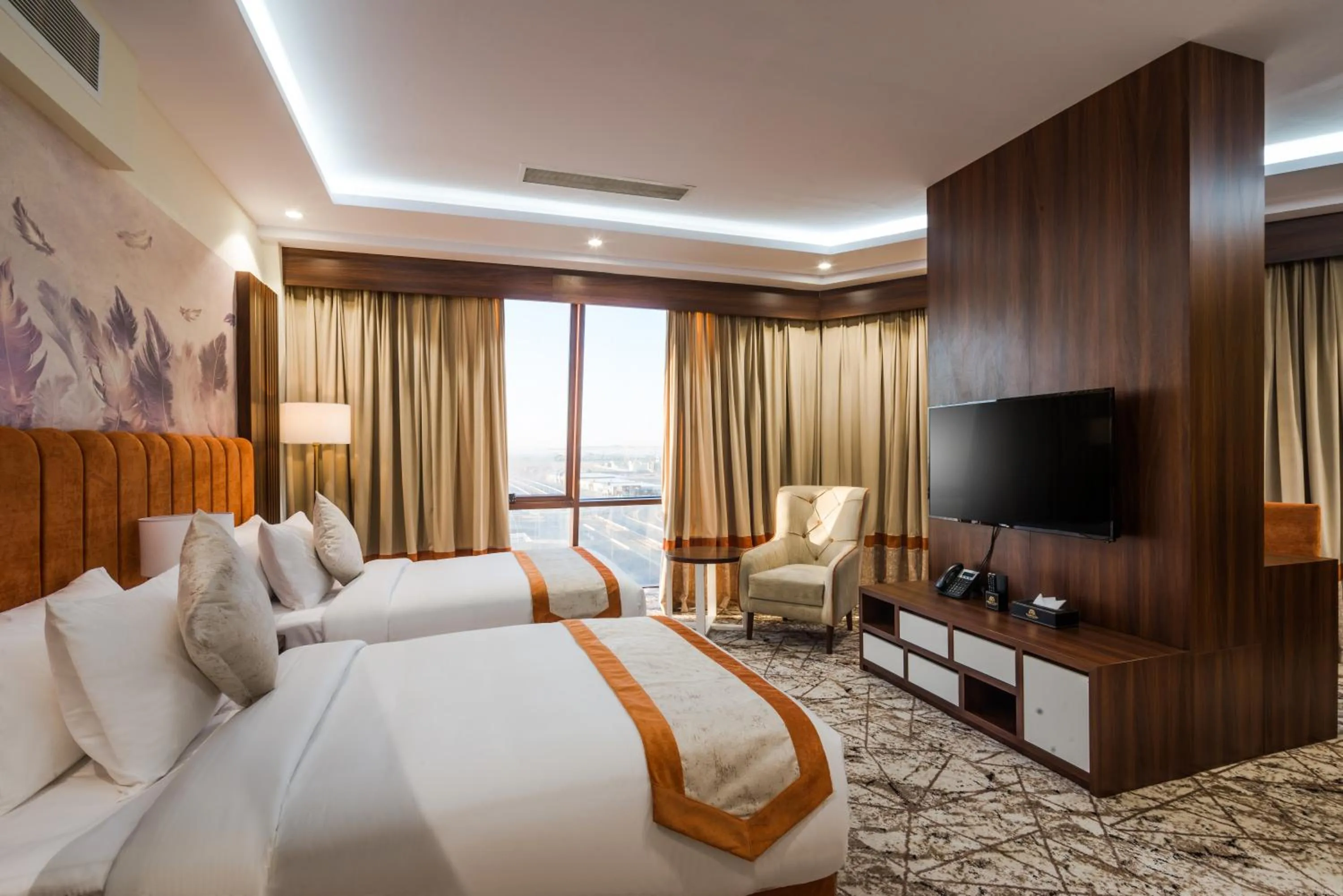 Bed in Tulip Plaza Hotel