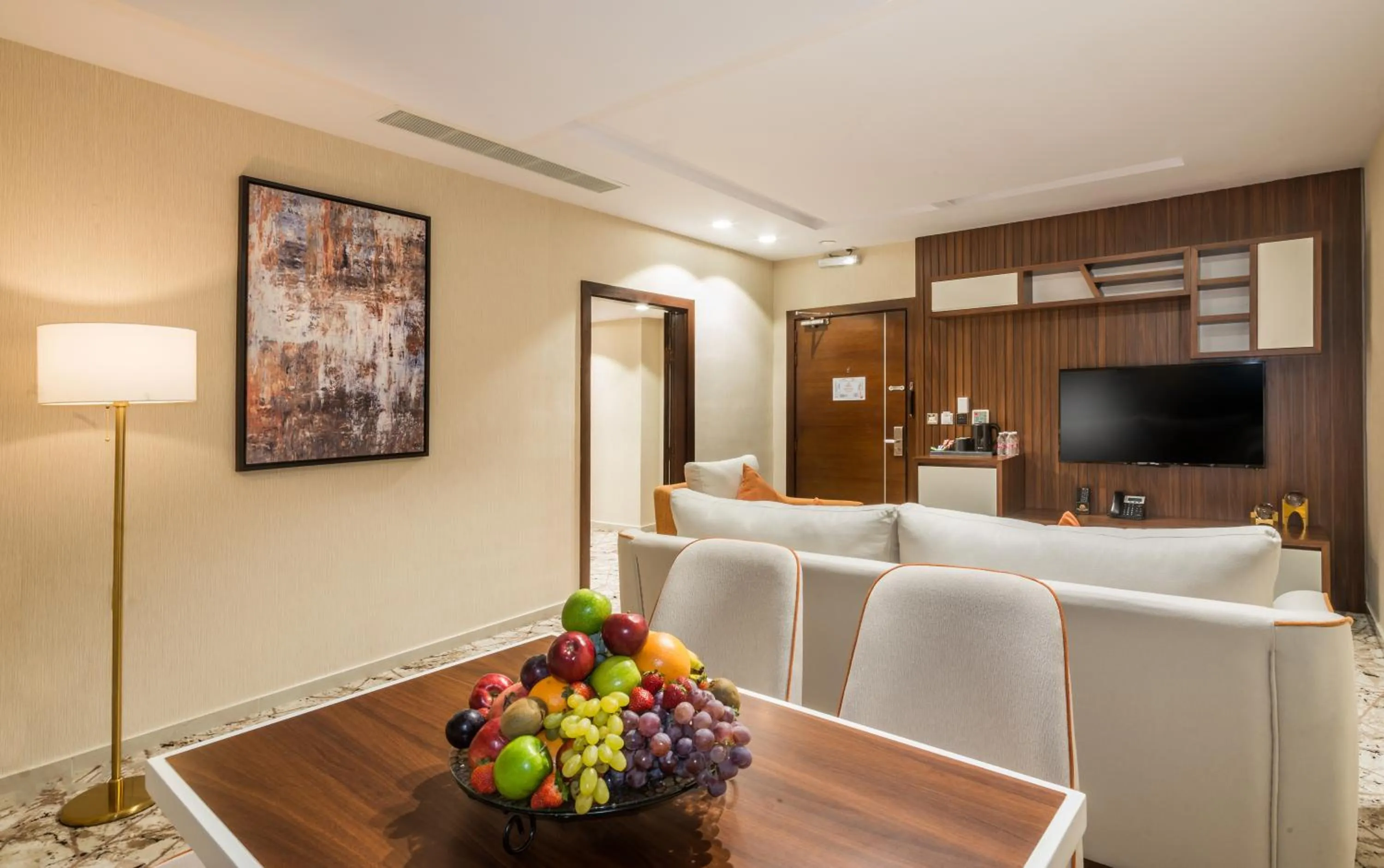 Communal lounge/ TV room in Tulip Plaza Hotel